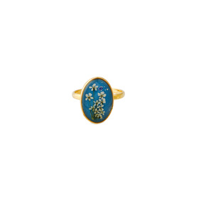 Золотистое овальное голубое кольцо с белыми цветками