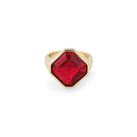 Золотистое кольцо с красным кристаллом