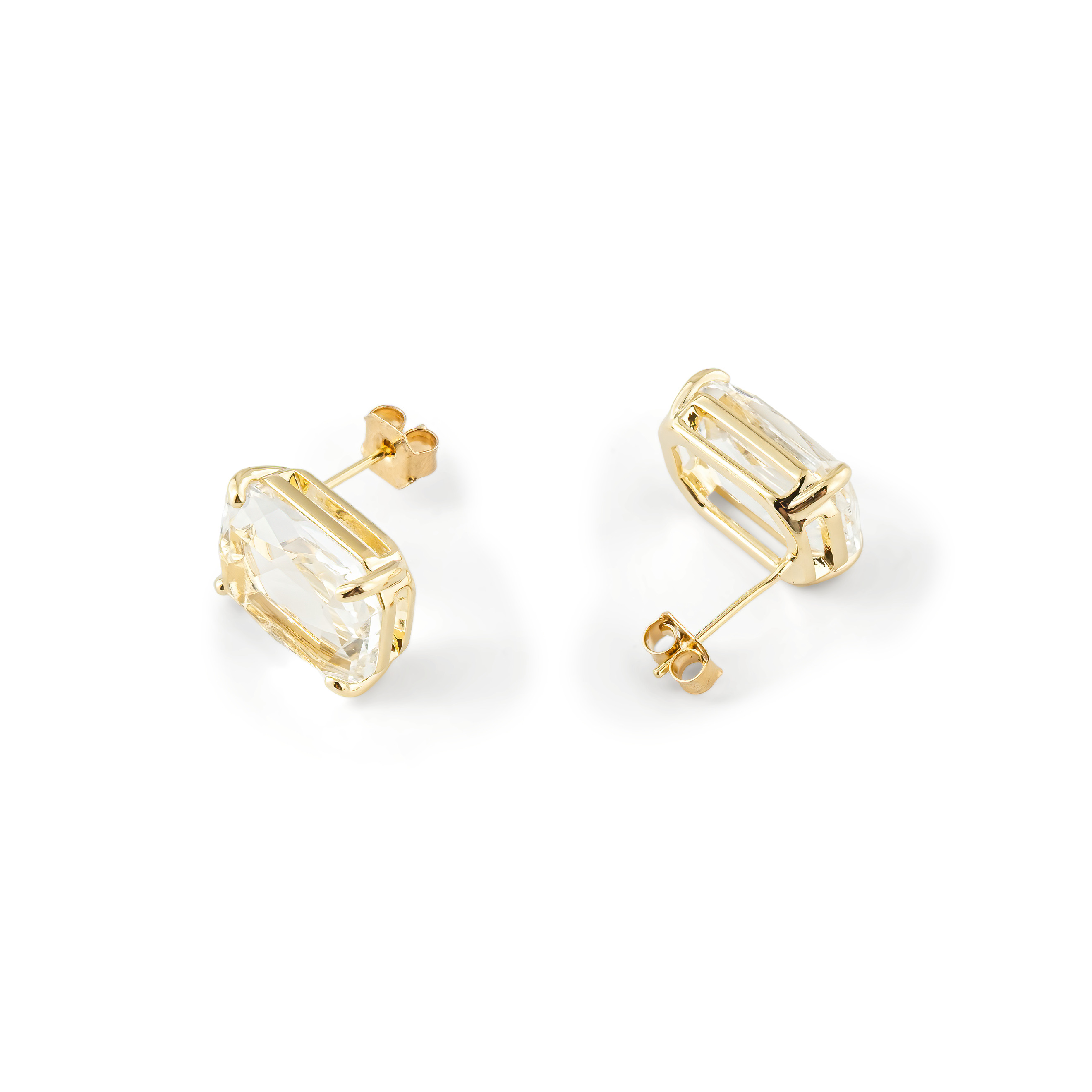Golden stud earrings with a large white crystal
