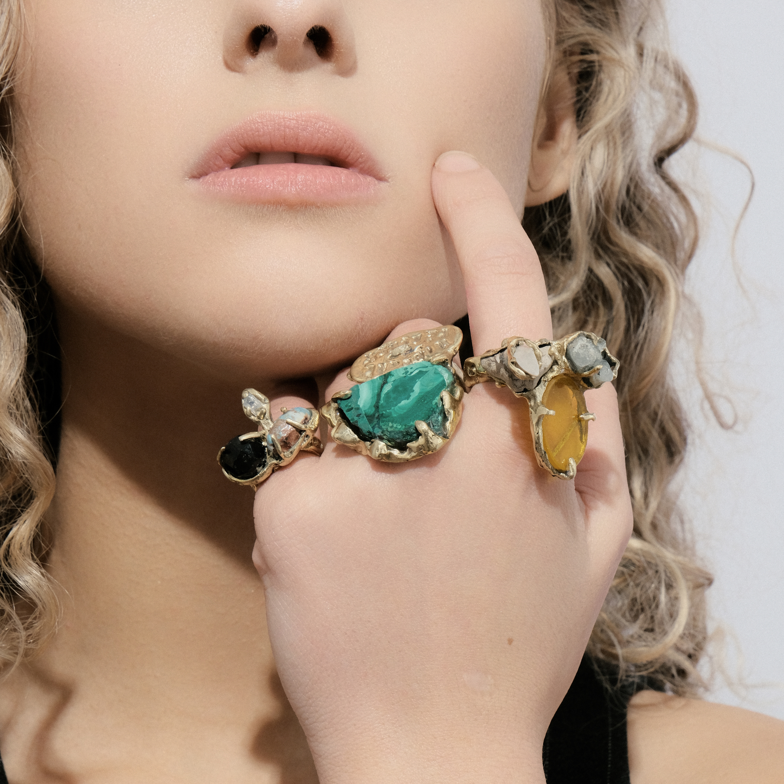 Brass ring with inserts: topaz, lens and shark tooth