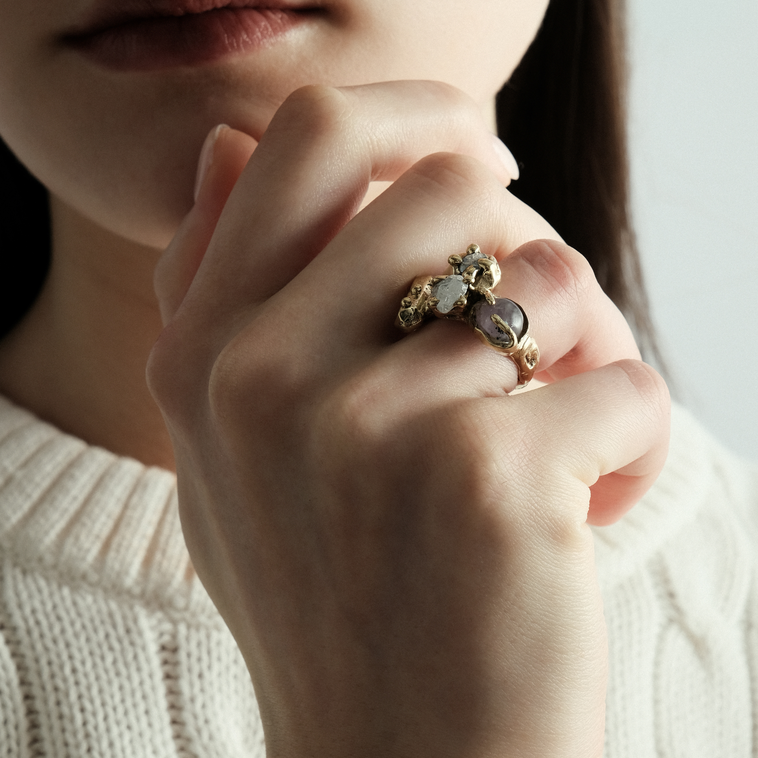 Brass ring with inserts: amethyst and two cubic zirconia