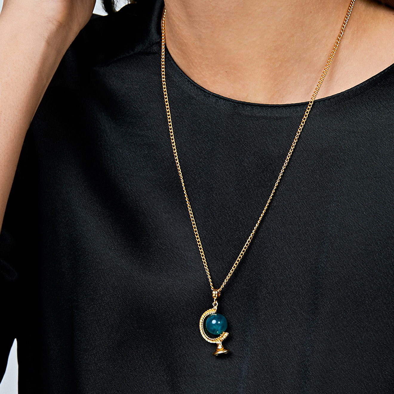Gilded Globe charm necklace, from The art of layering collection