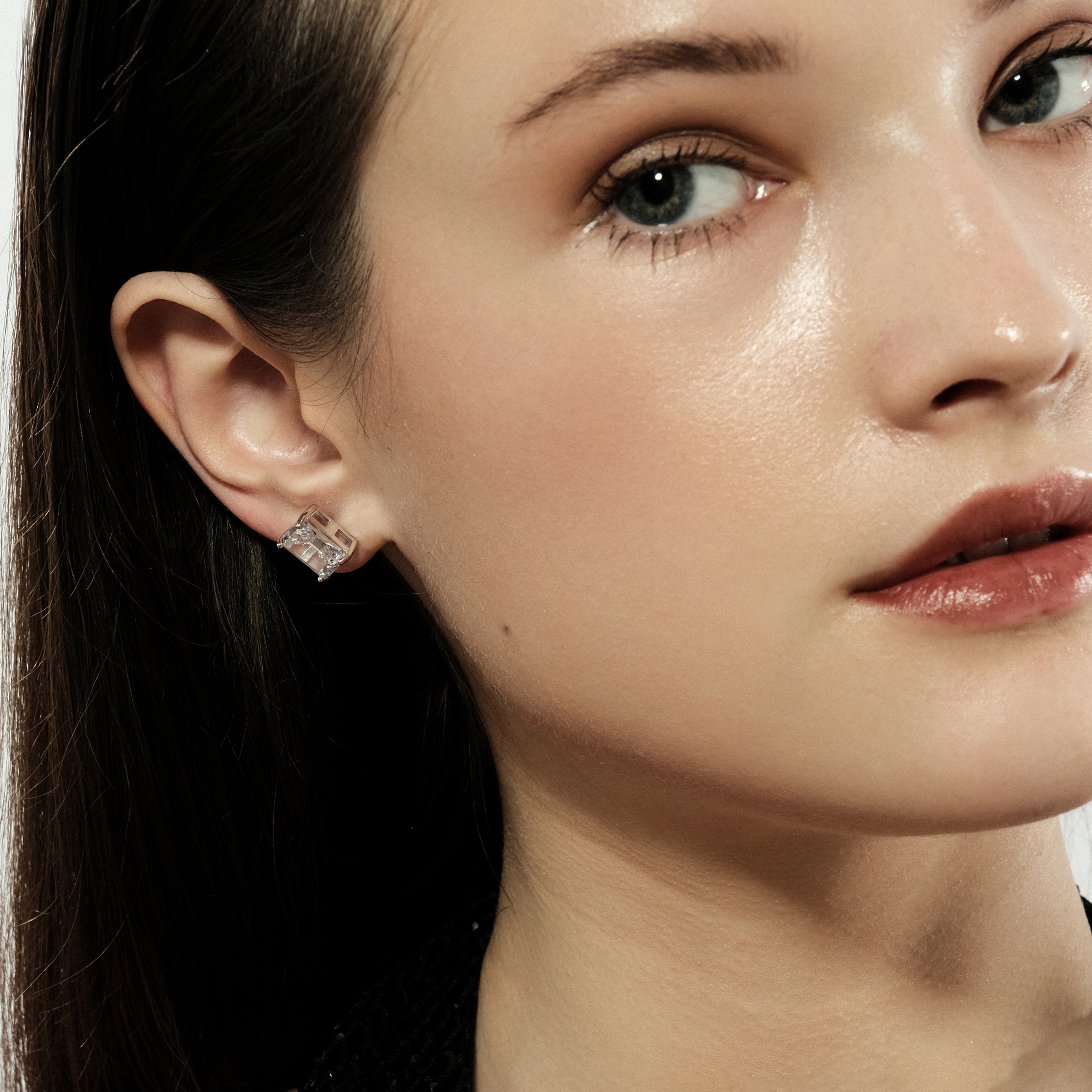 Silver stud earrings with white crystal