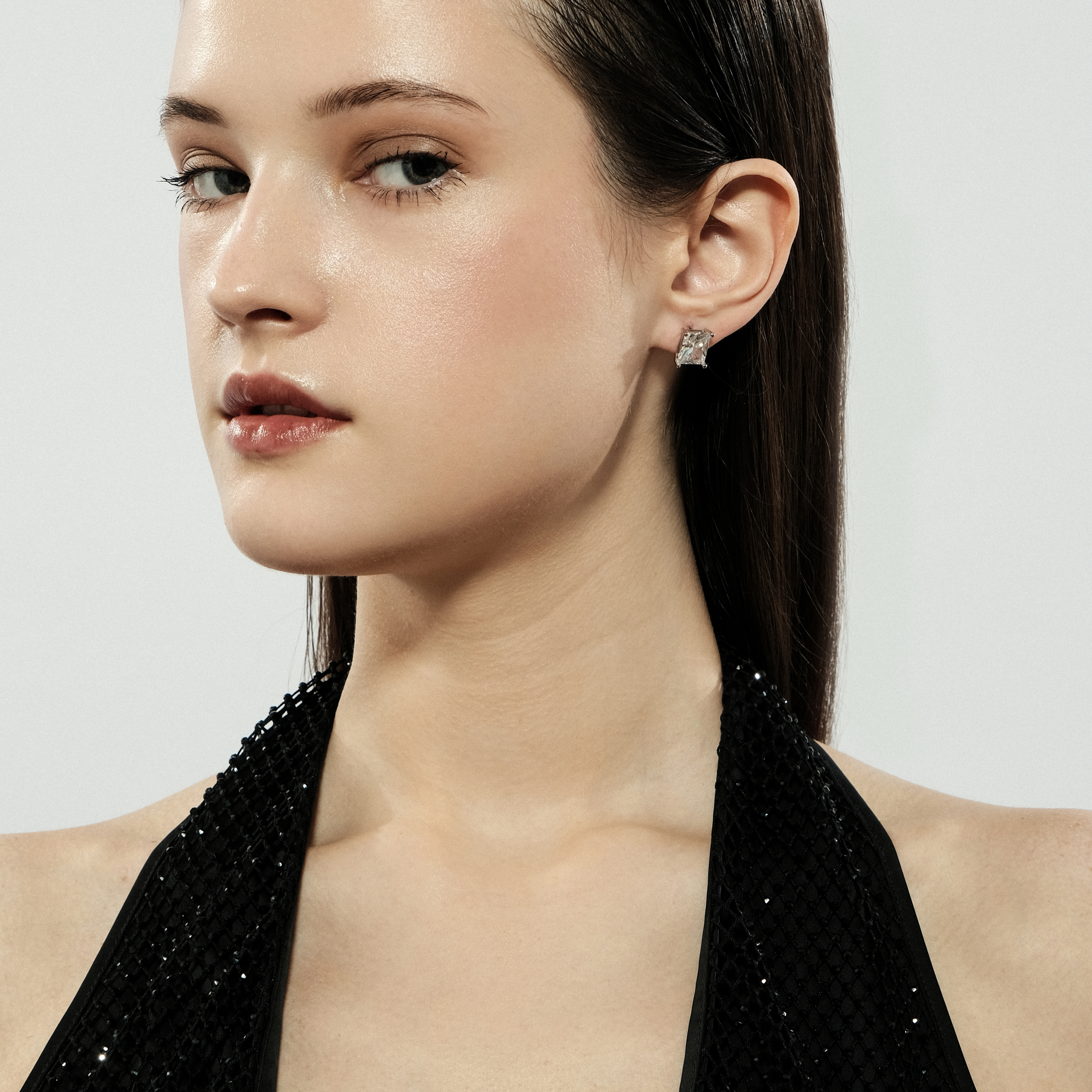 Silver stud earrings with white crystal