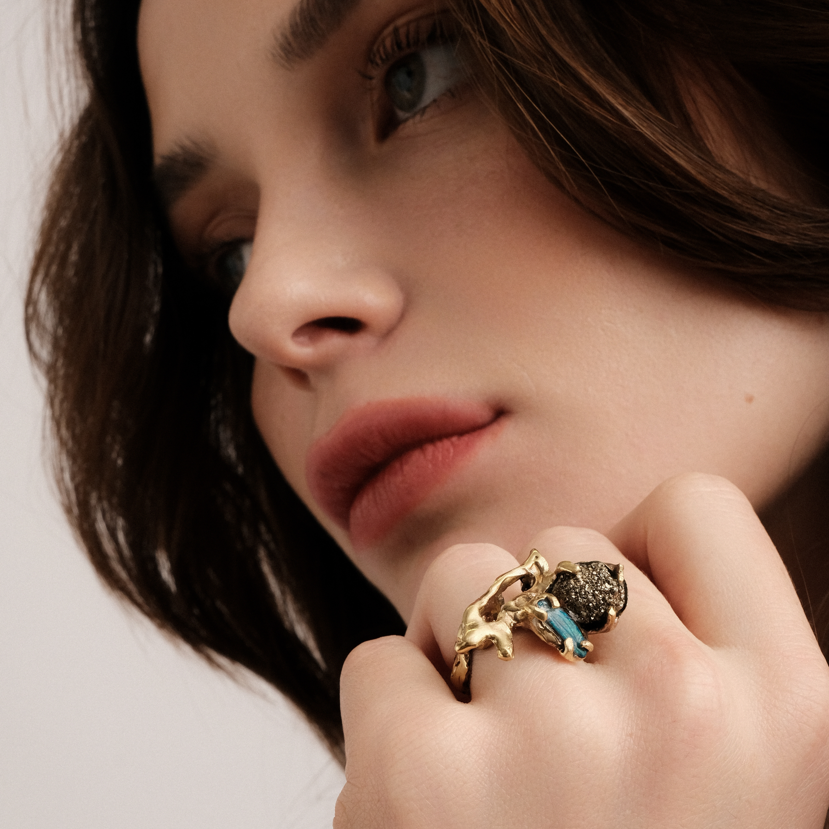 Brass ring with inserts: black Australian opal and pyrite