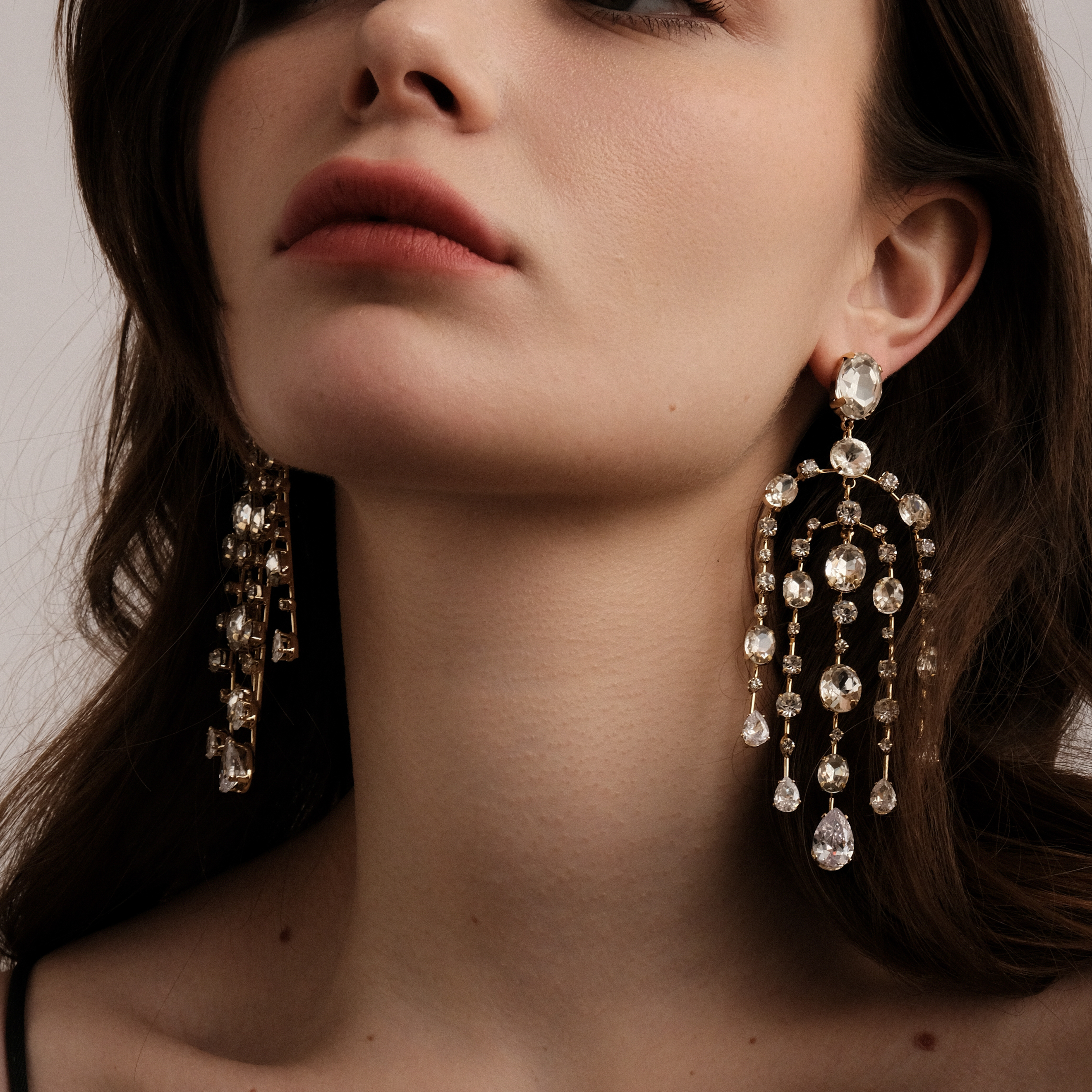 Golden long earrings with crystals