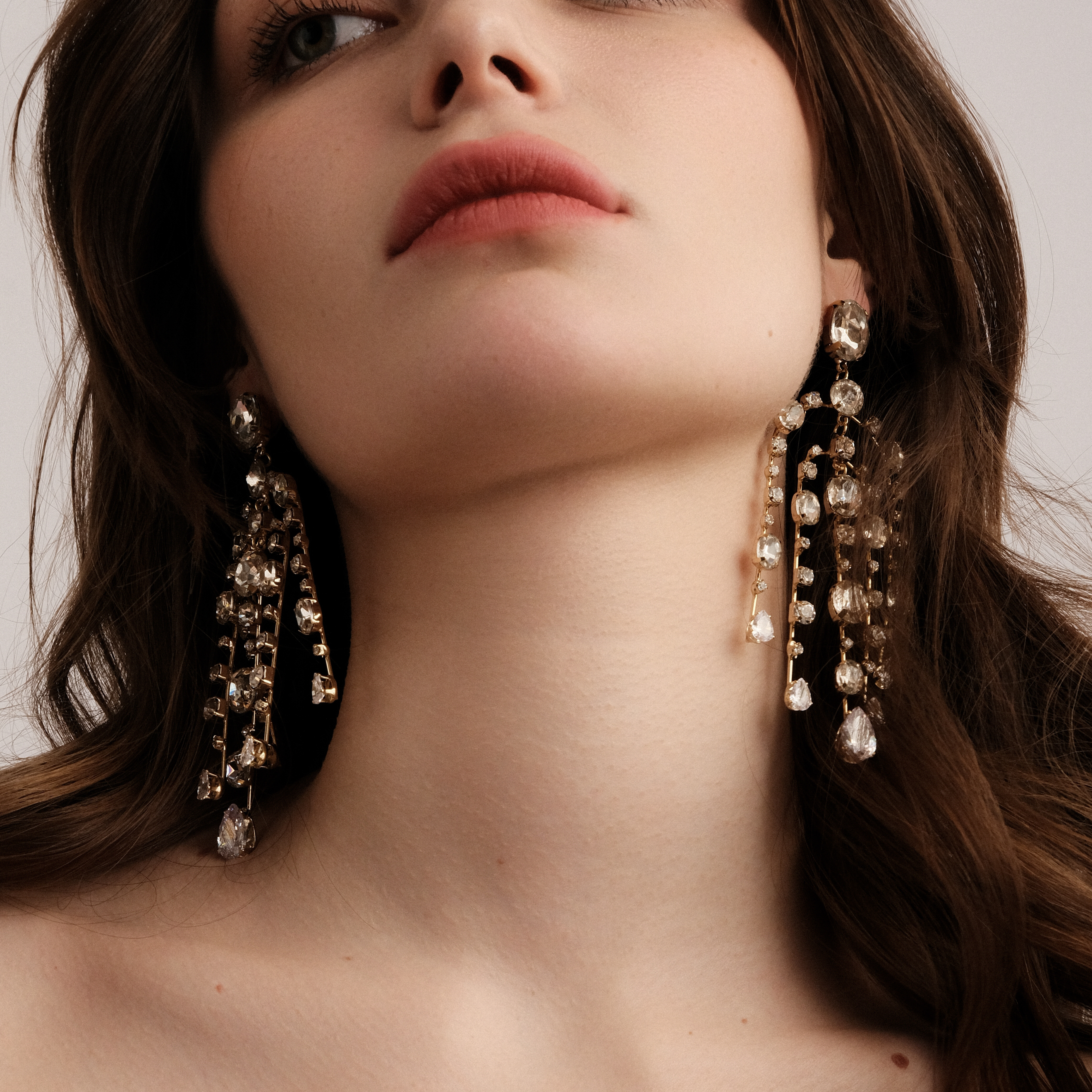 Golden long earrings with crystals