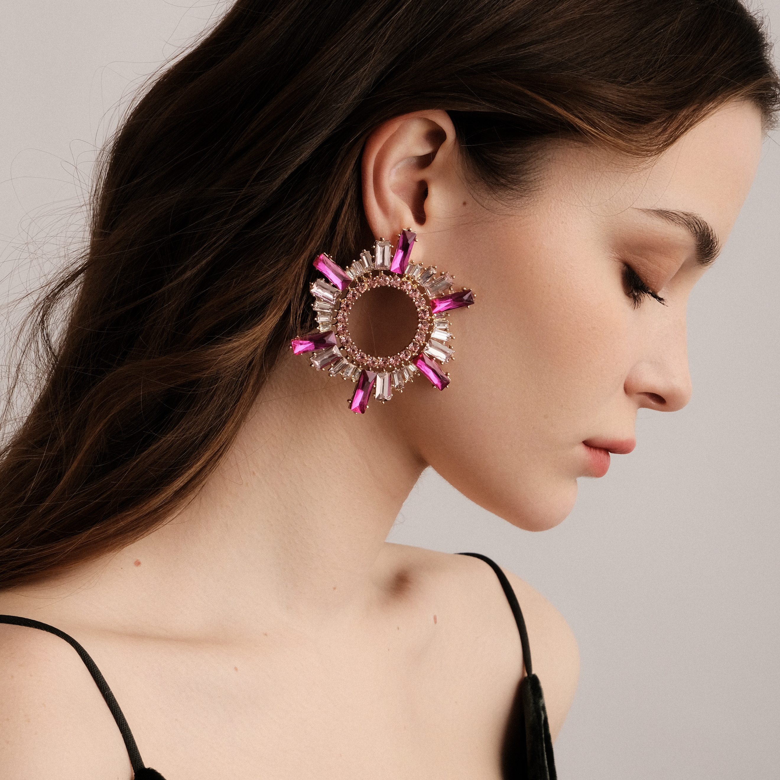 Golden earrings with pink crystals