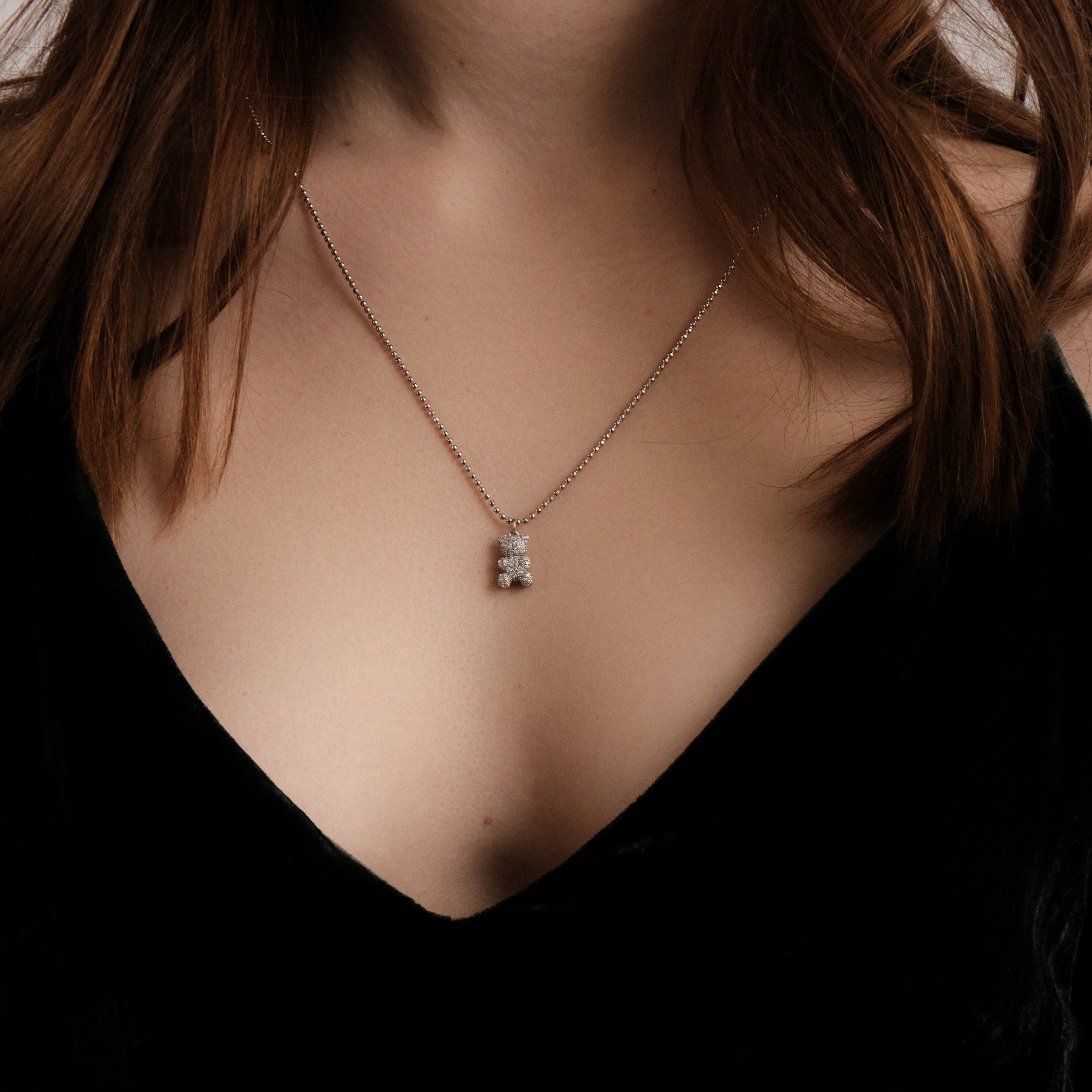 Silver pendant with crystal bears