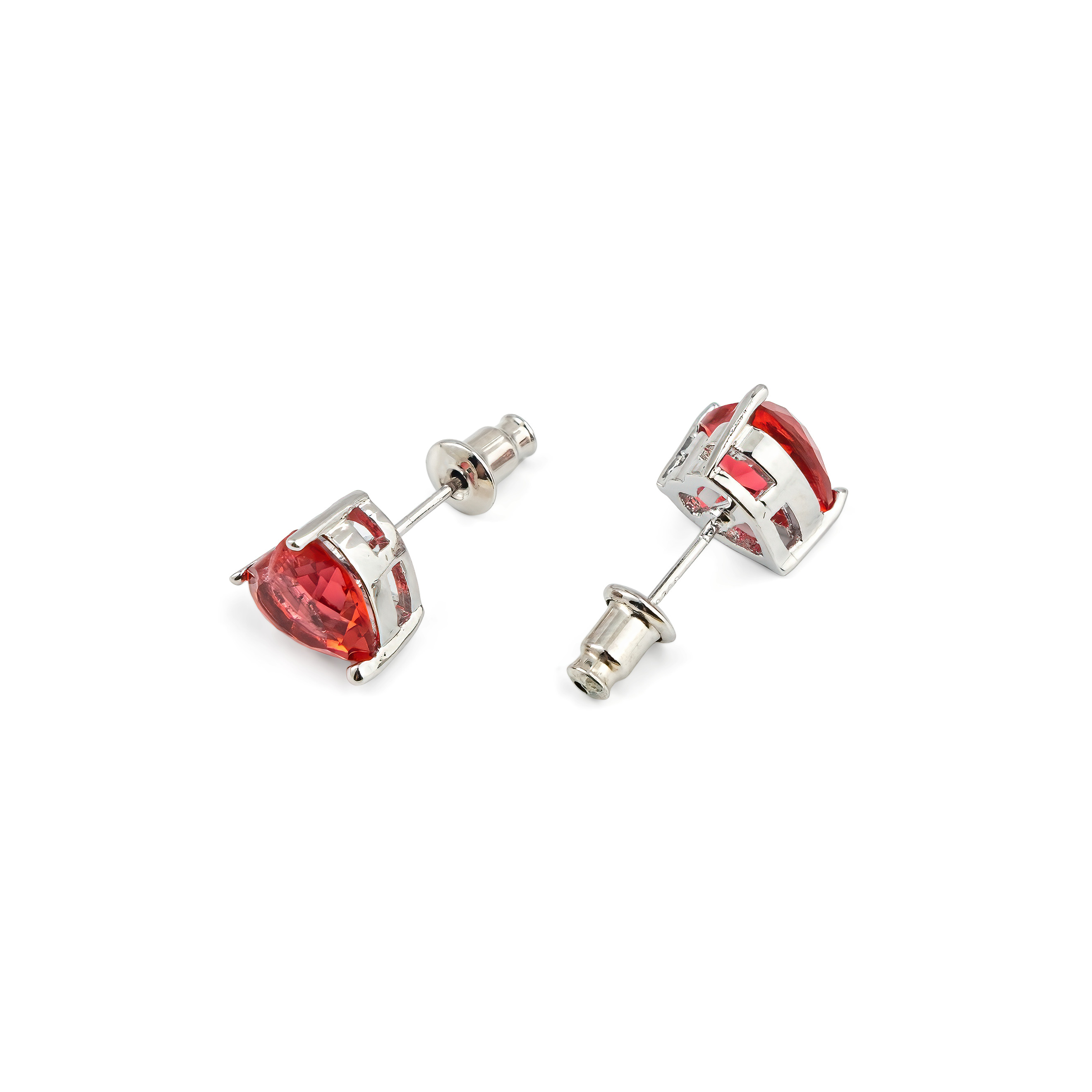 Silver earrings in the shape of a red heart