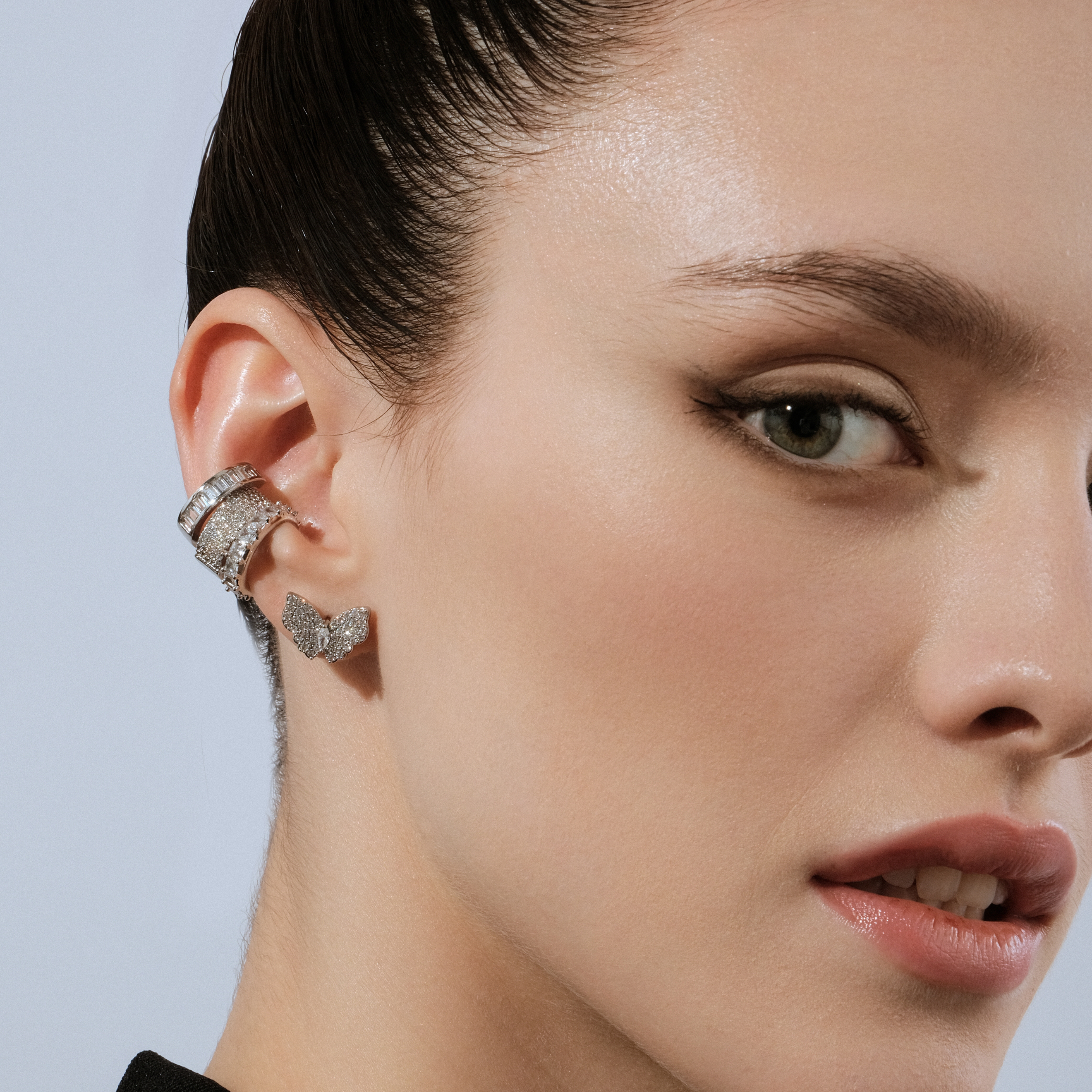 Silver set of earrings and cuffs with butterflies
