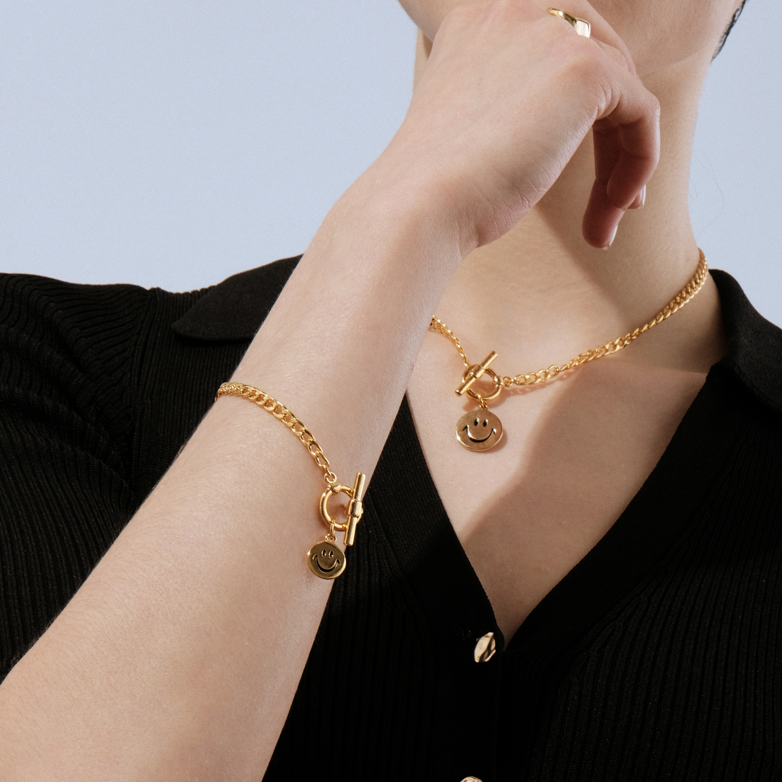 Golden bracelet with a smiley face