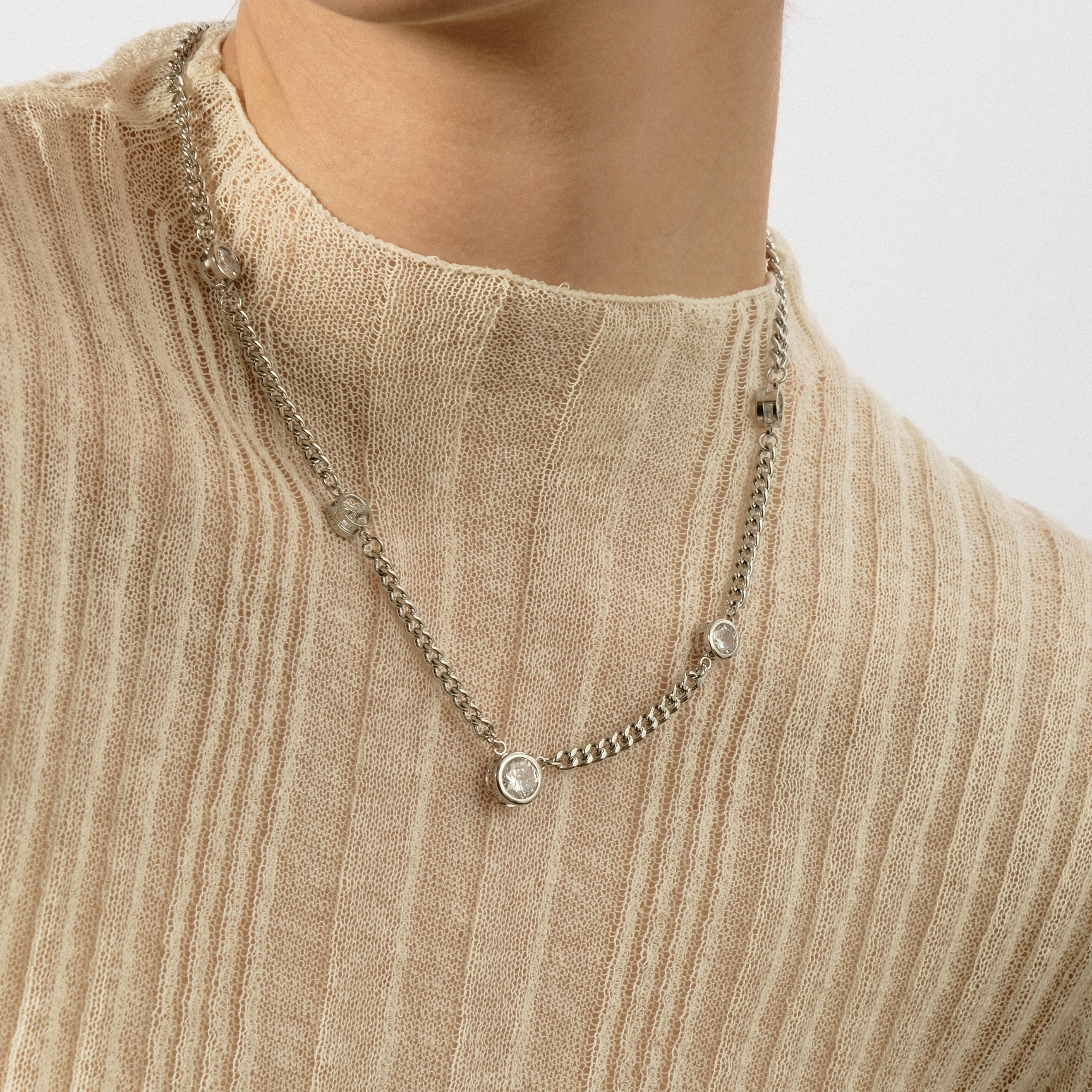 Silver necklace with white crystals