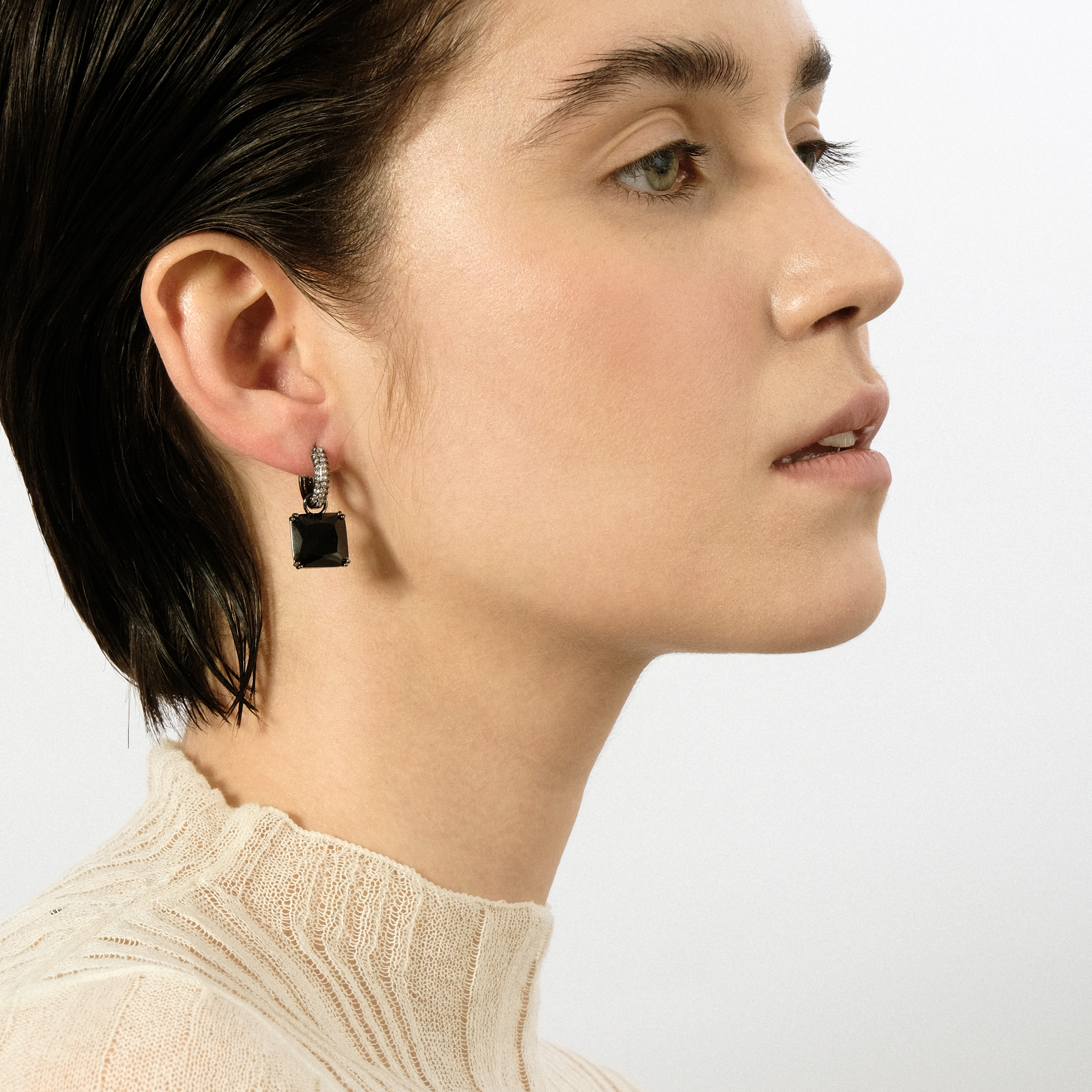 Silver earrings with square black crystal and peacock