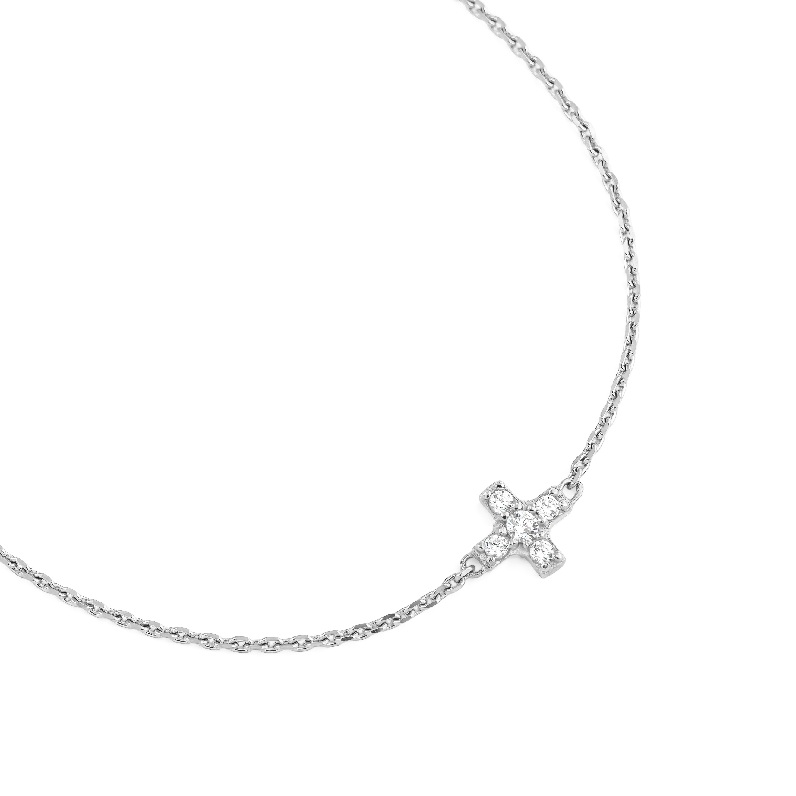 Bracelet with a small cross with white gold stones