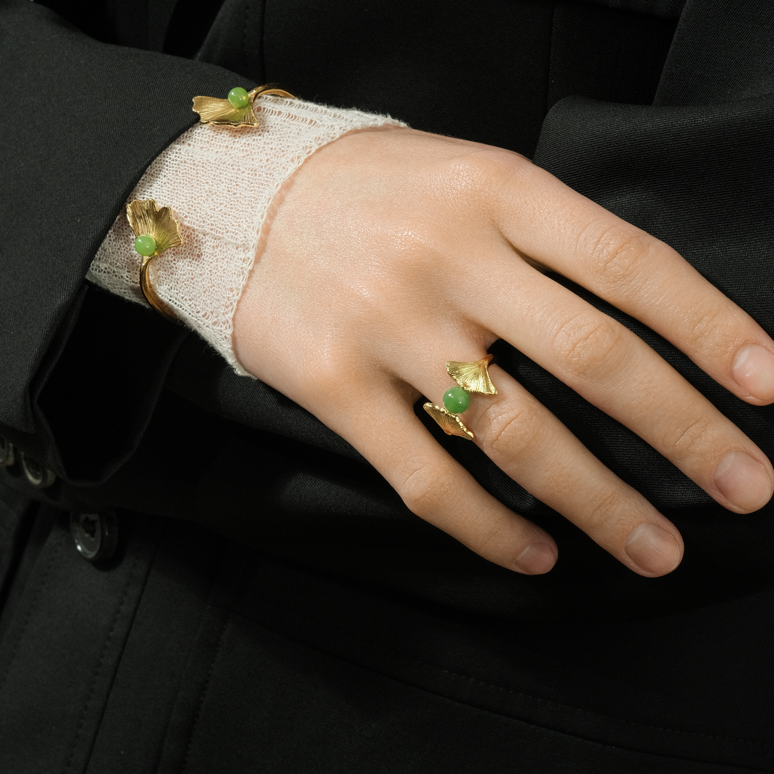 Gold GINKGO bracelet with green crystal
