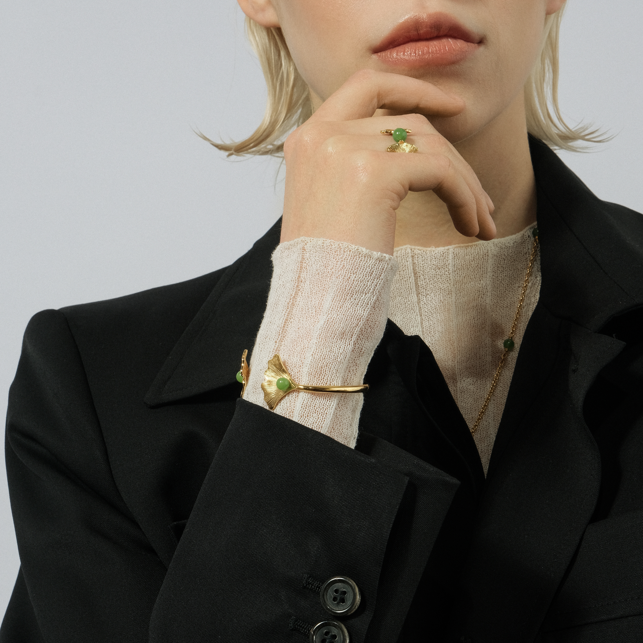 Gold GINKGO bracelet with green crystal