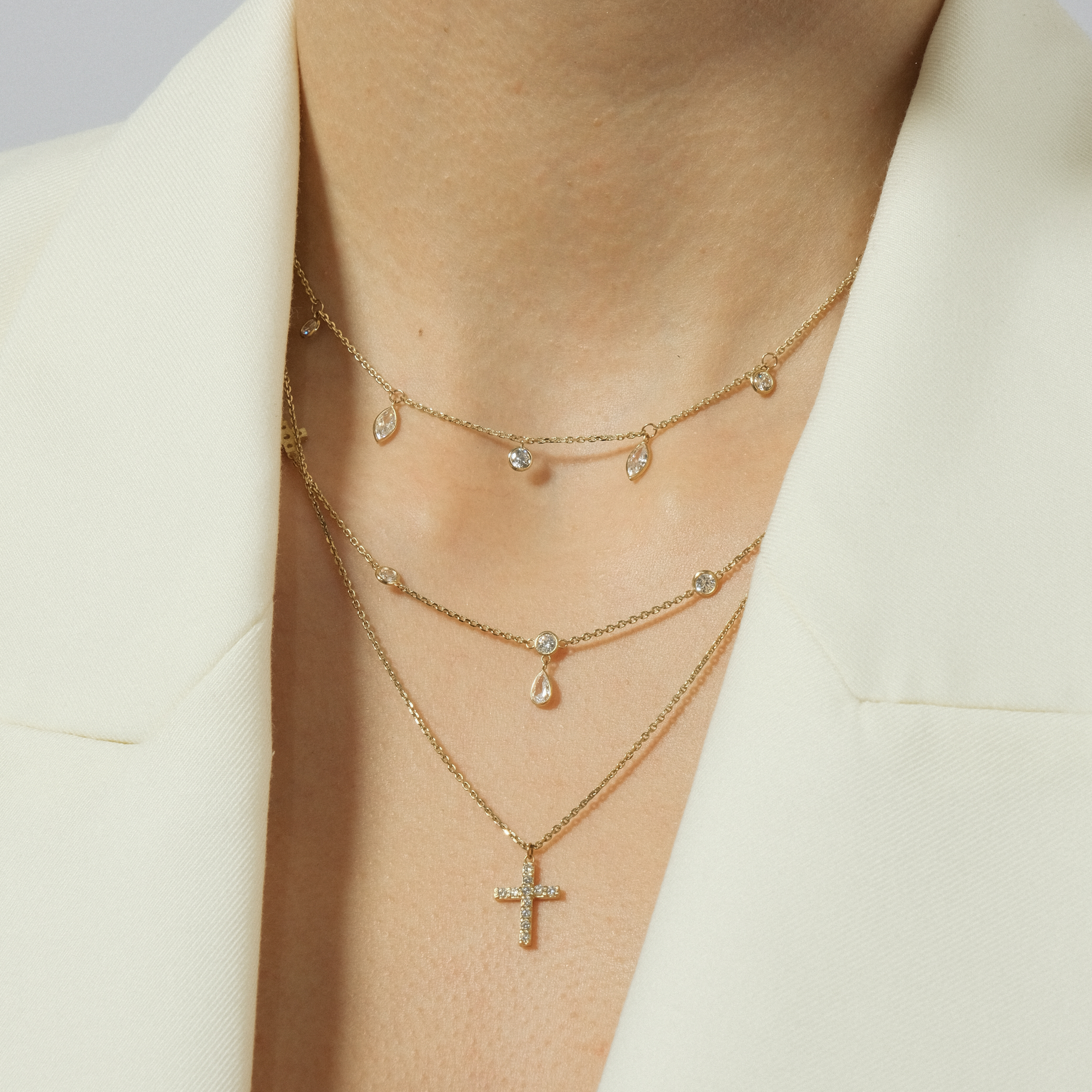Double necklace-tie with three crosses in yellow gold