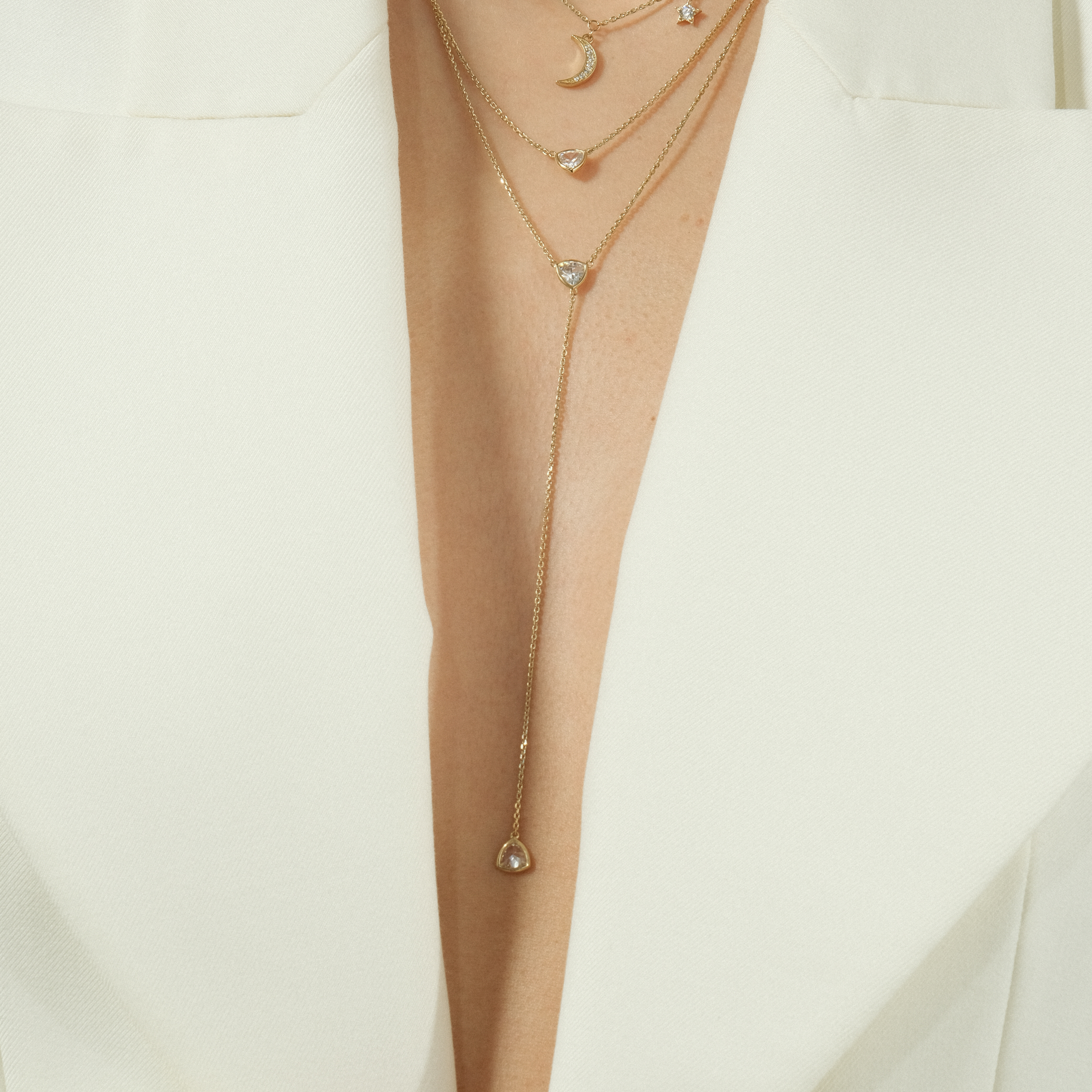 Double necklace-tie in trillions of yellow gold