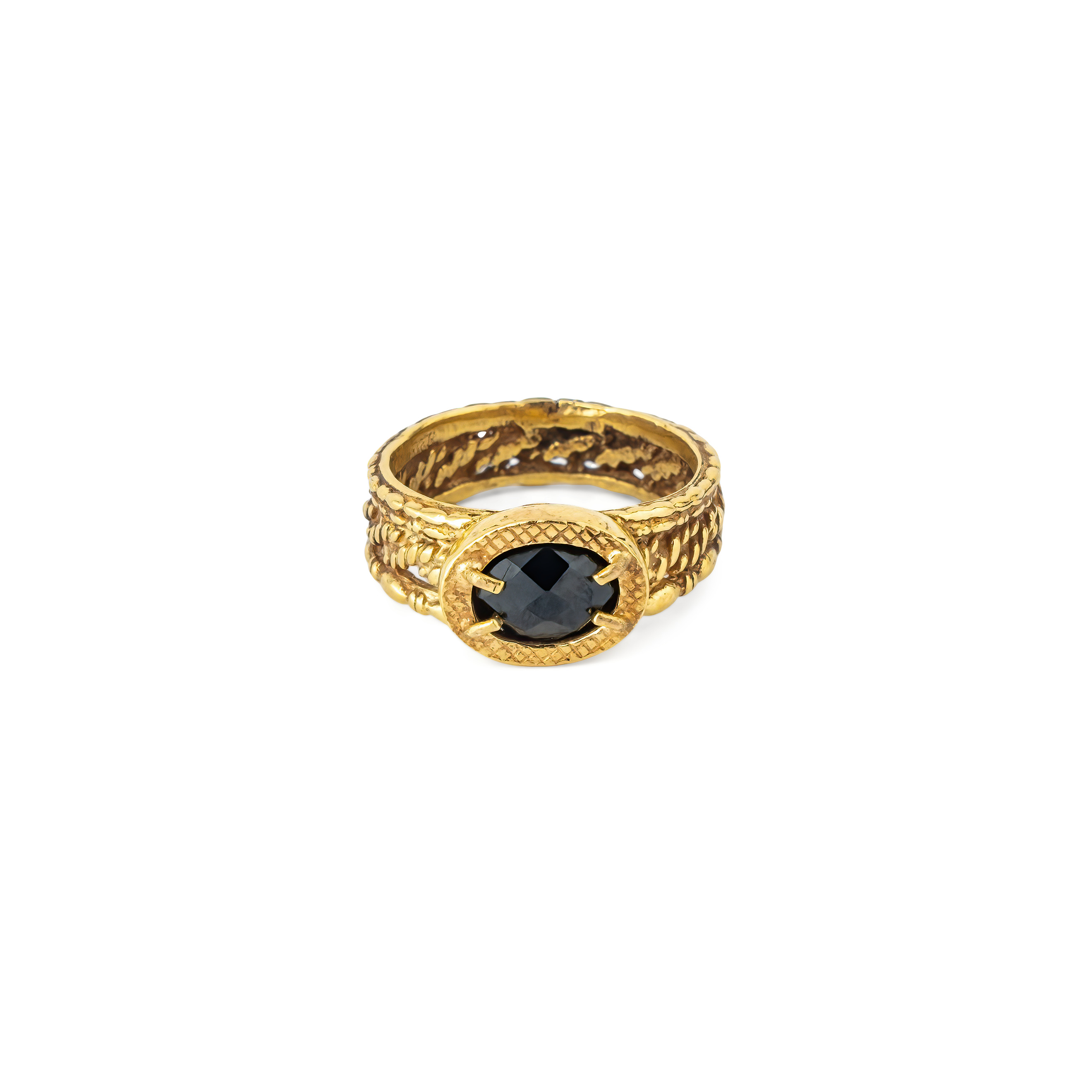 Golden ring with black spinel