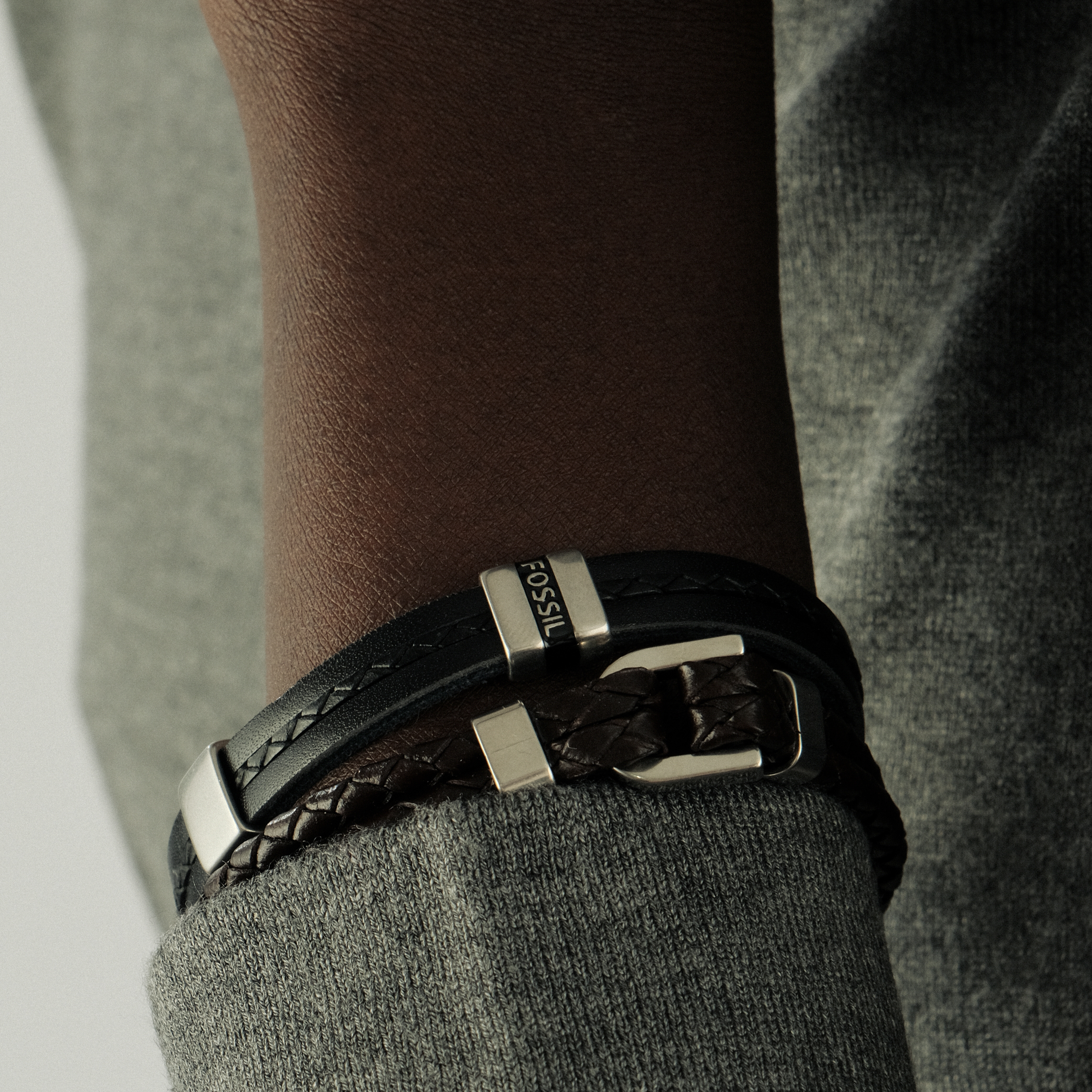 Black leather bracelet with steel inserts