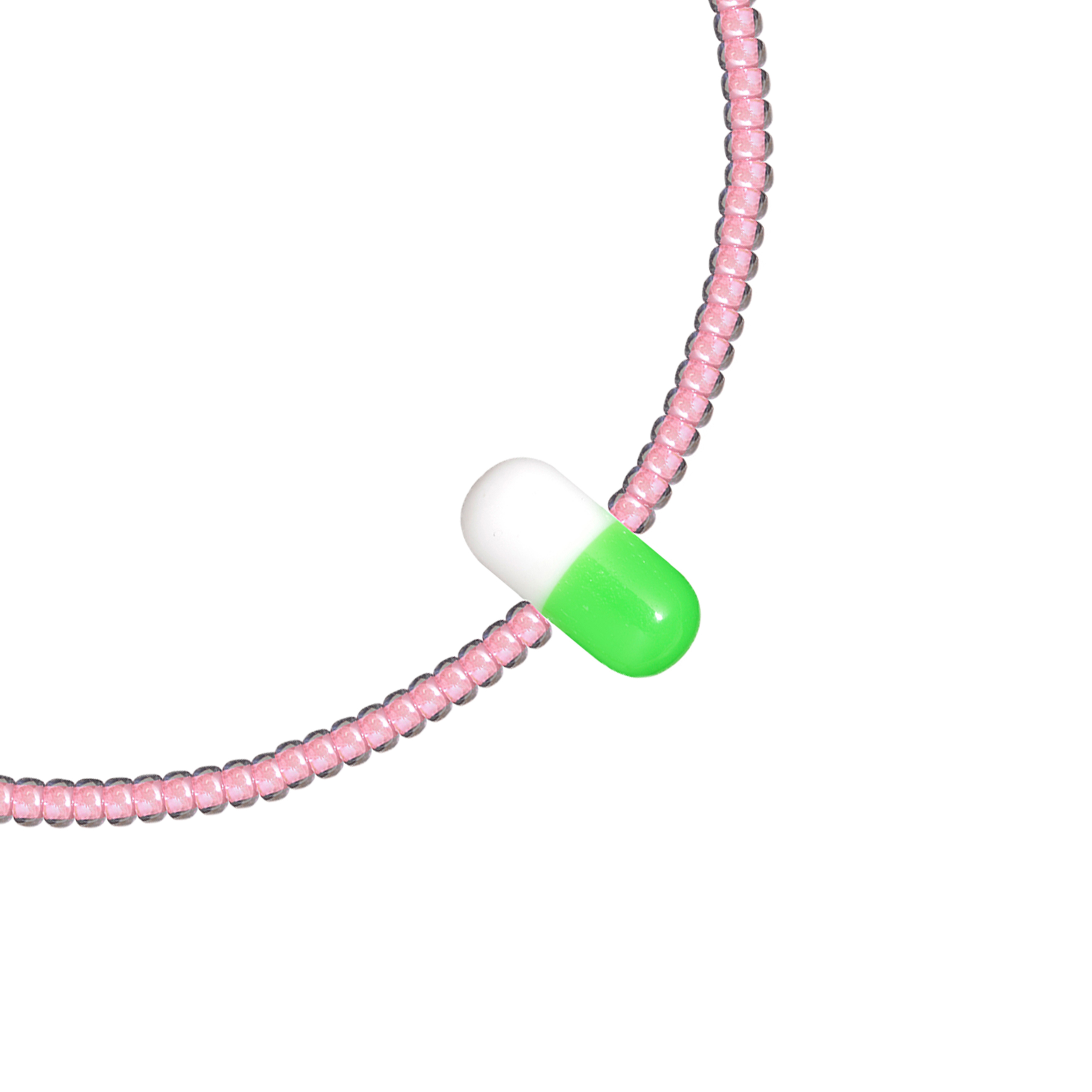 Pink bracelet with green pill