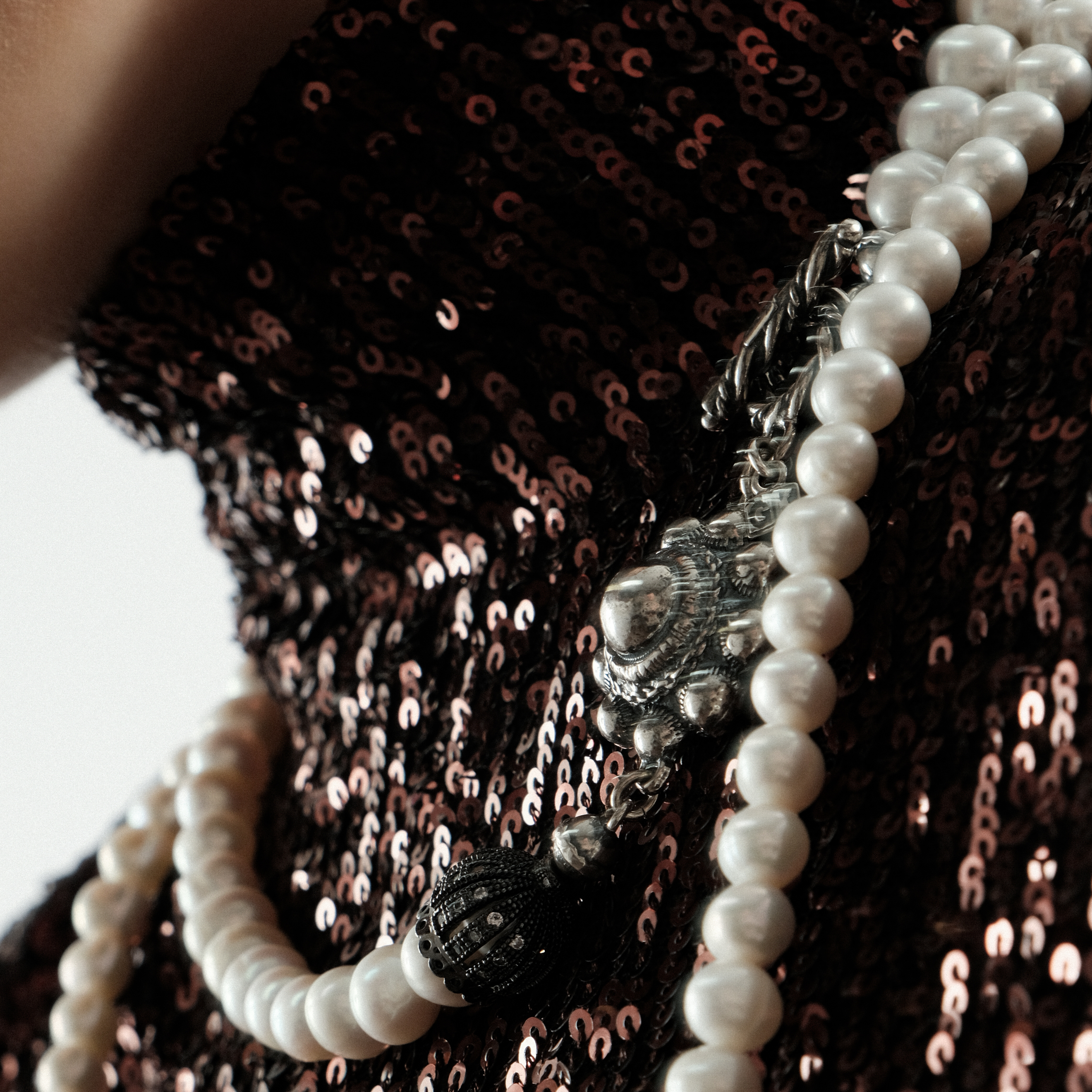 White pearly bead necklace with a silver chain