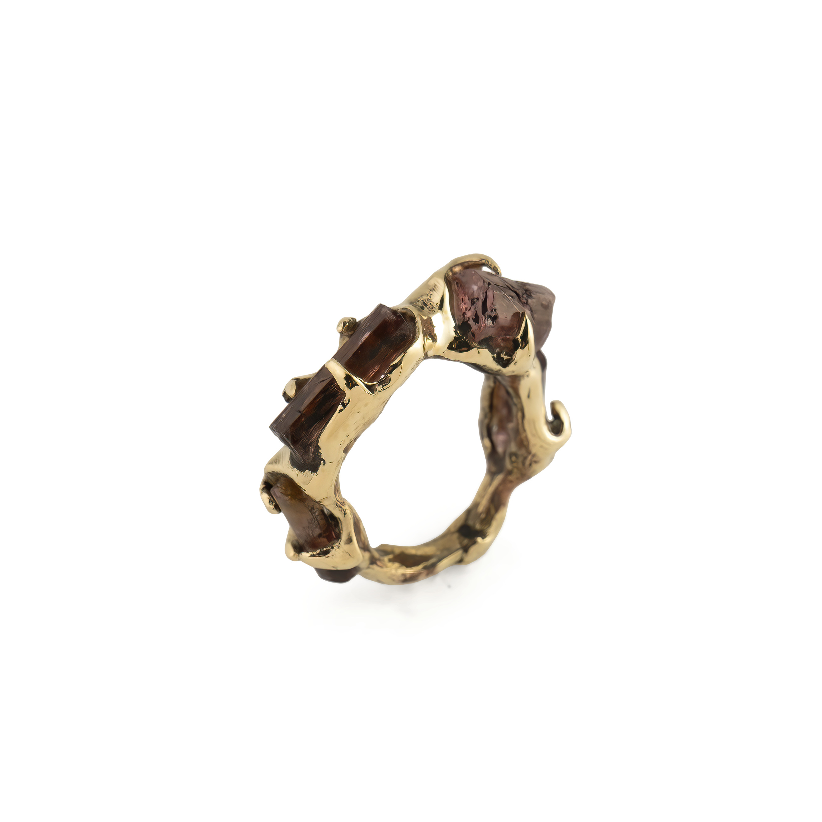 Brass ring with four tourmalines