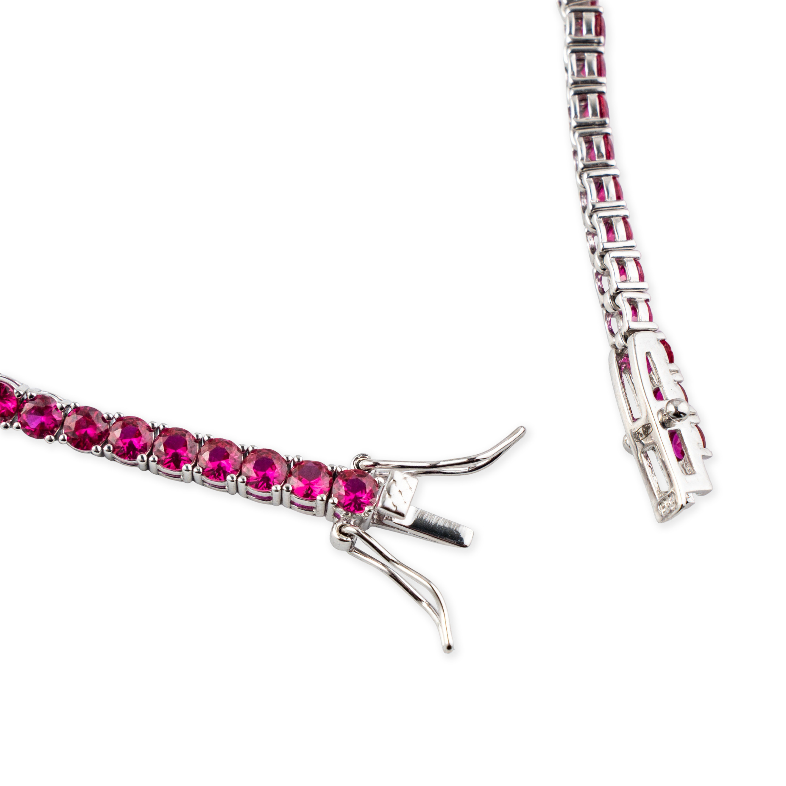 Silver bracelet with small pink crystals