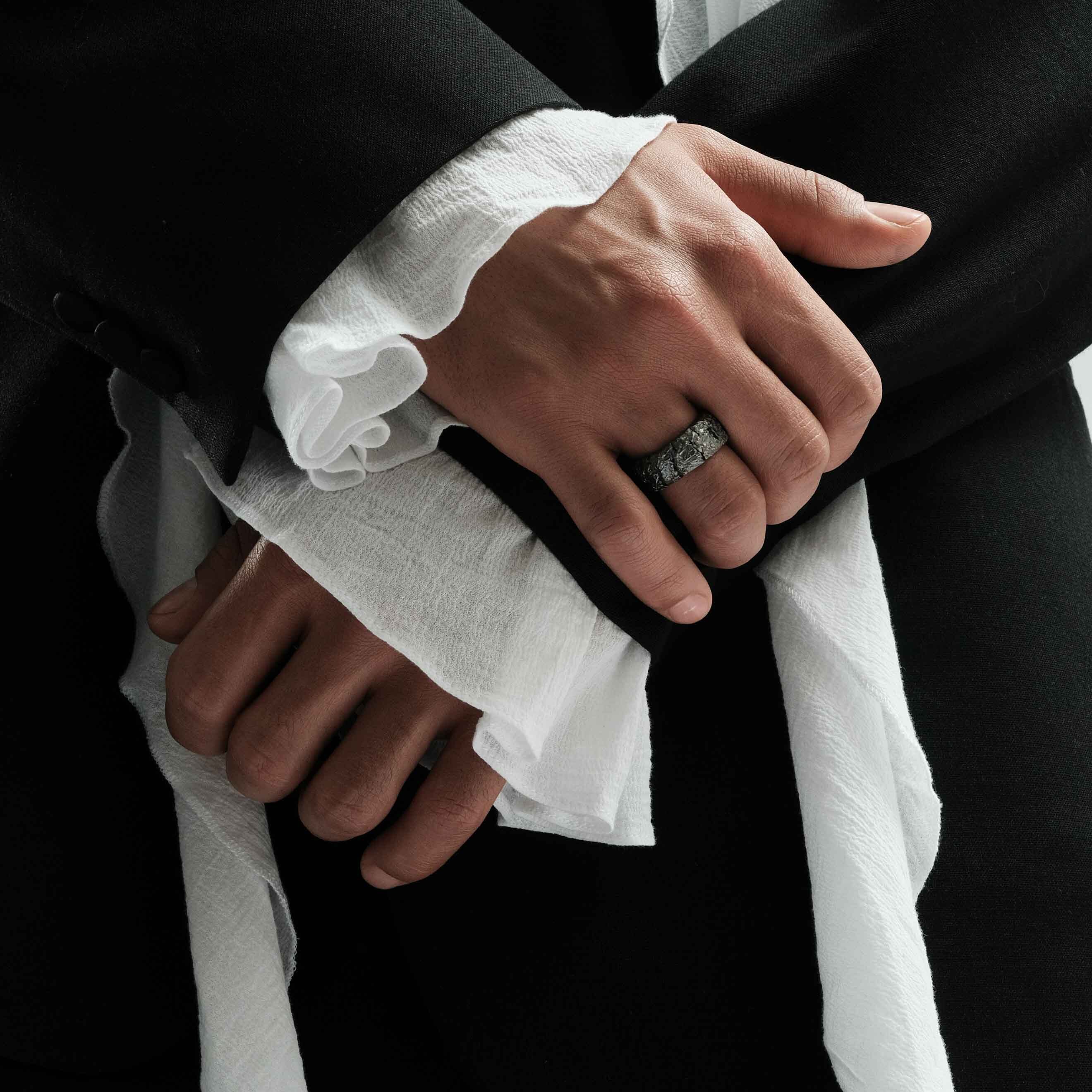Silver ring with cracks