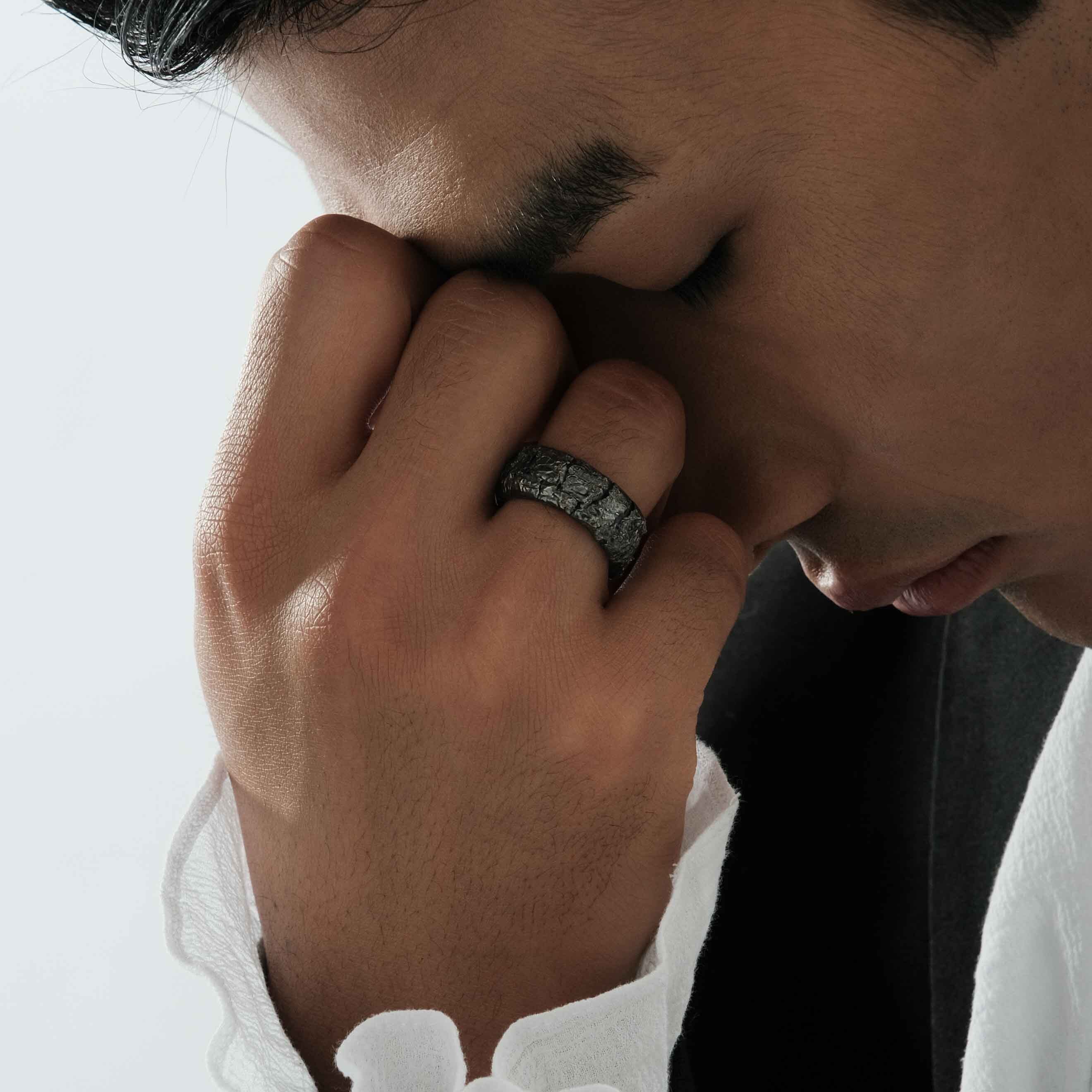 Silver ring with cracks