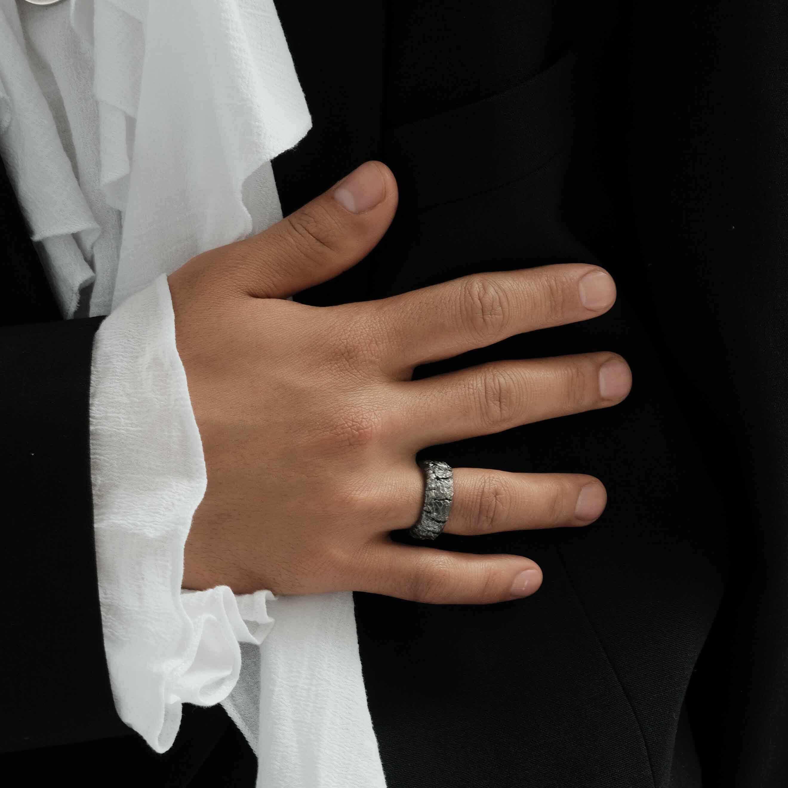 Silver ring with cracks