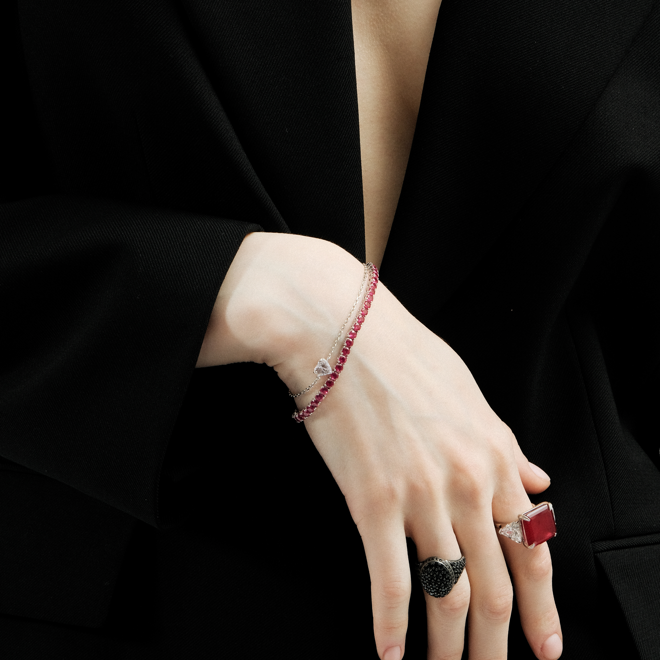 Silver bracelet with small pink crystals