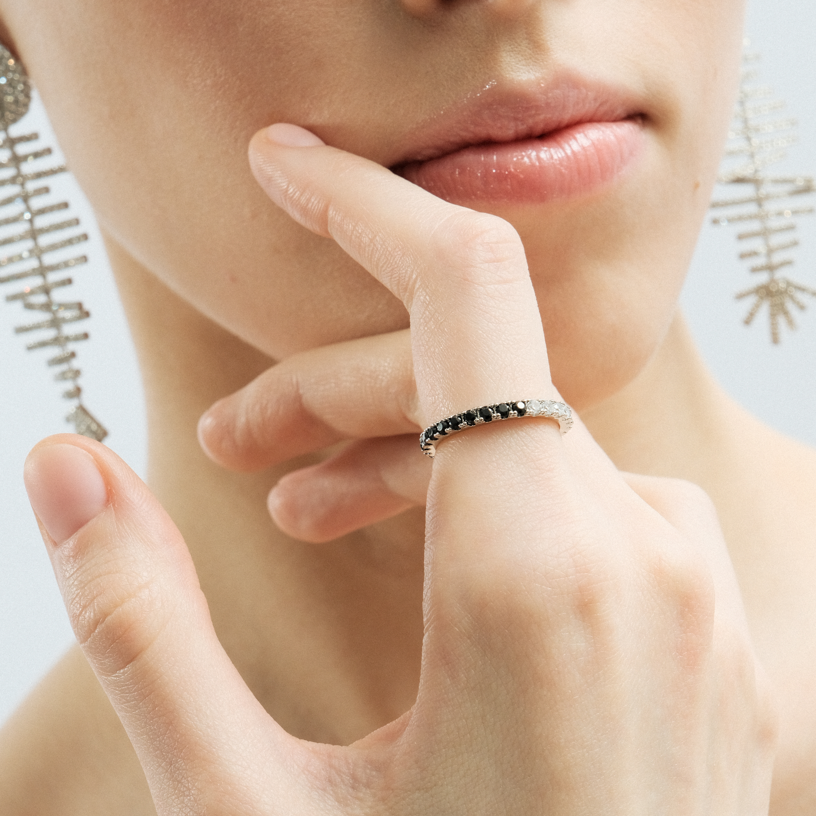 Silver ring with a pavé of black and white crystals