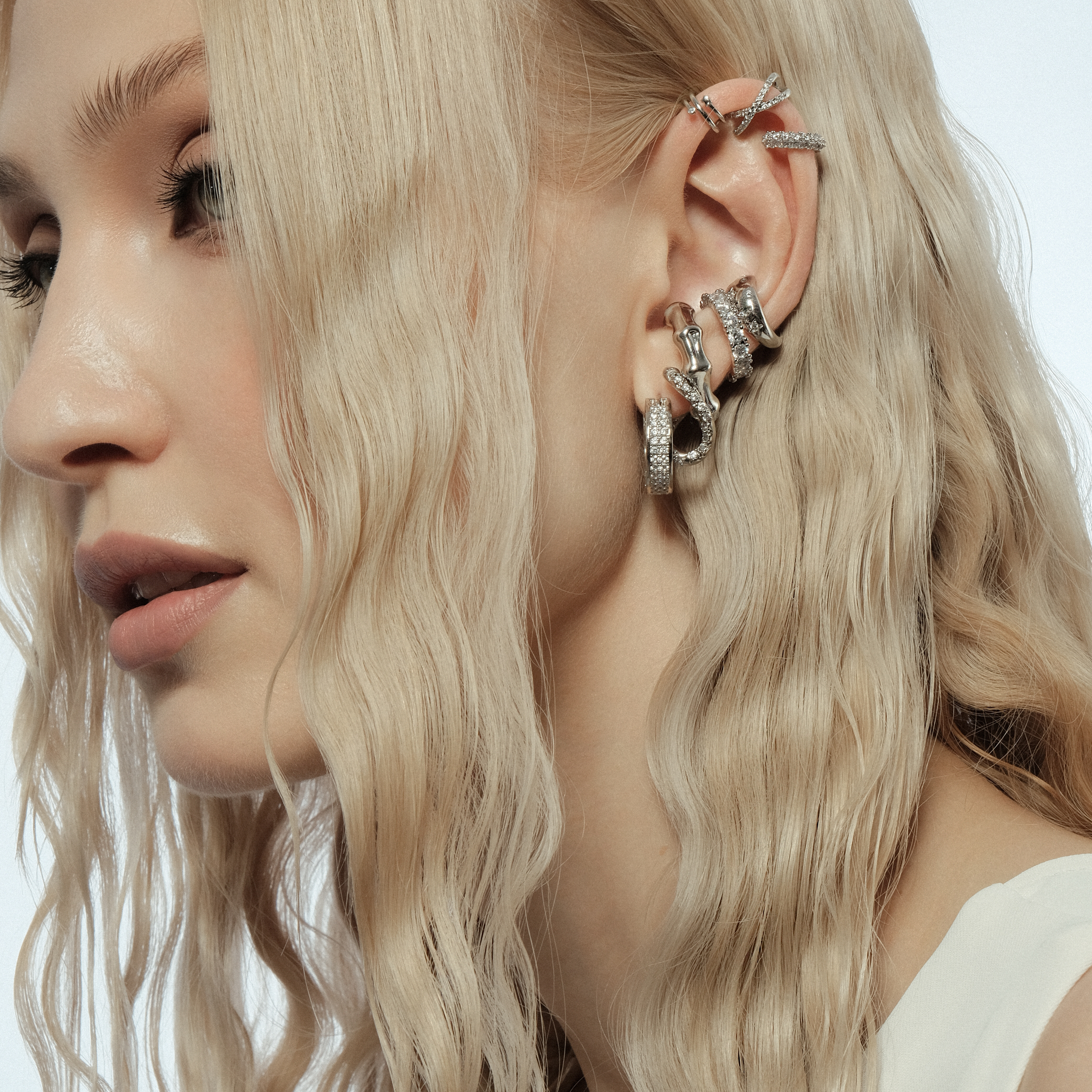 curved earrings with crystals
