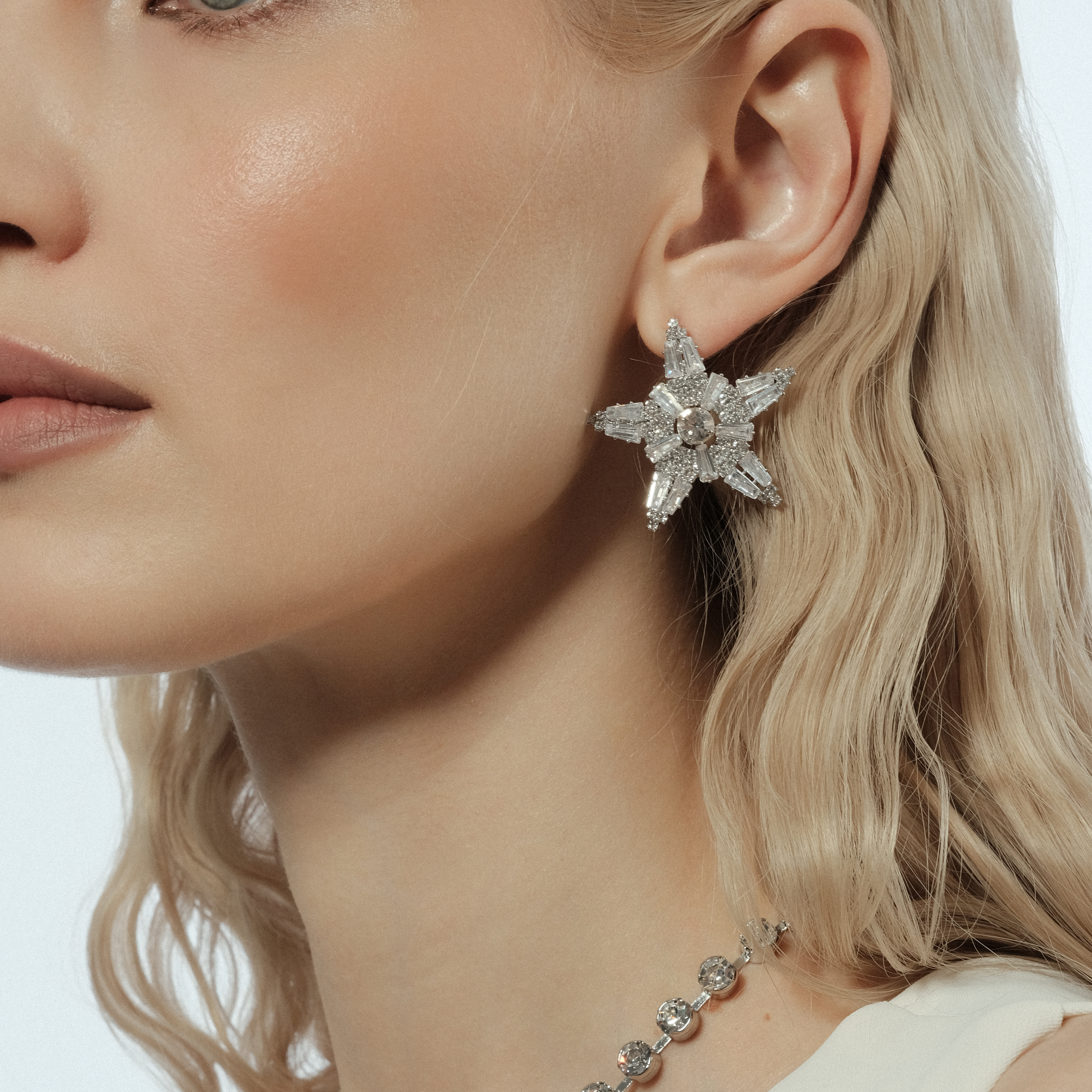 star earrings with glass inserts