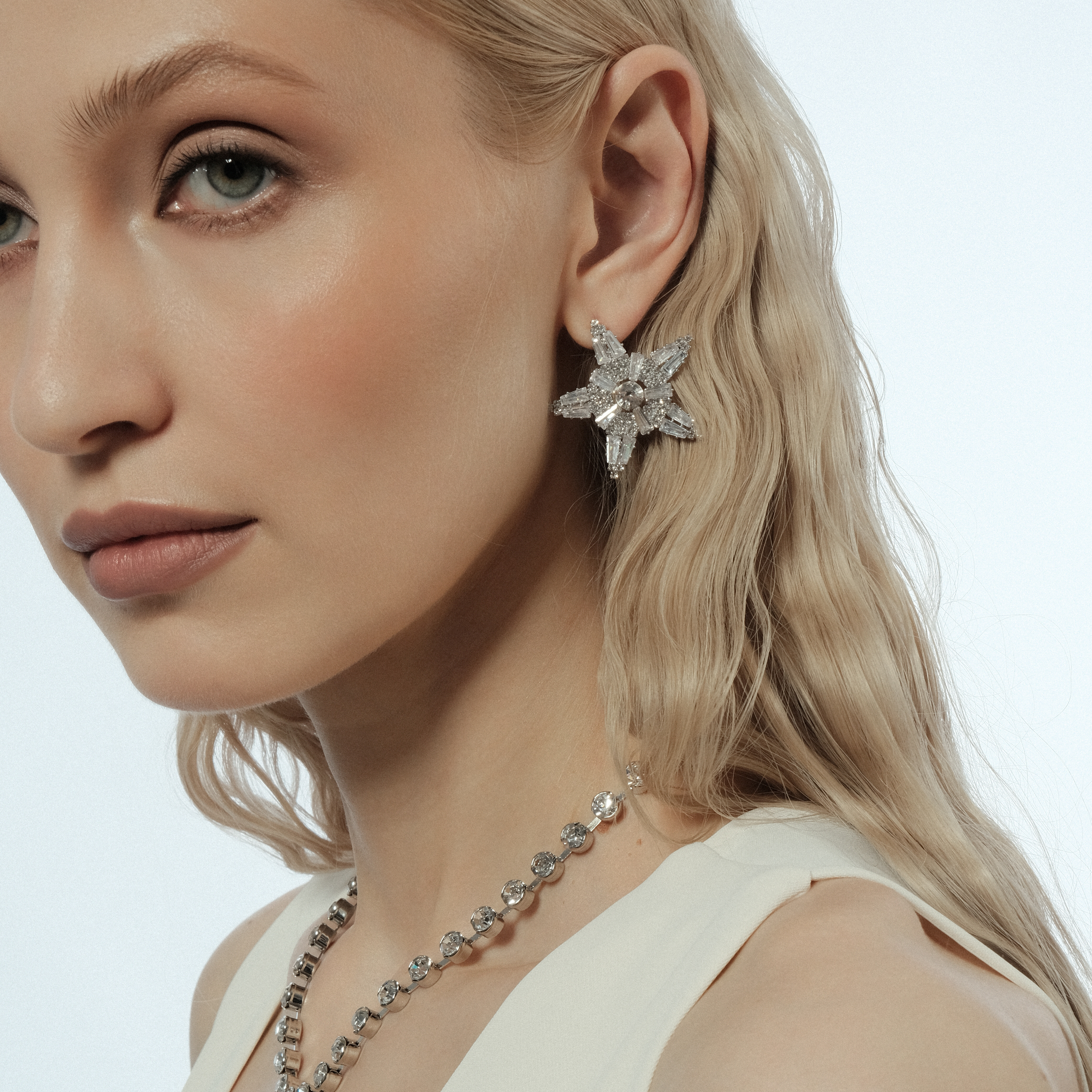 star earrings with glass inserts