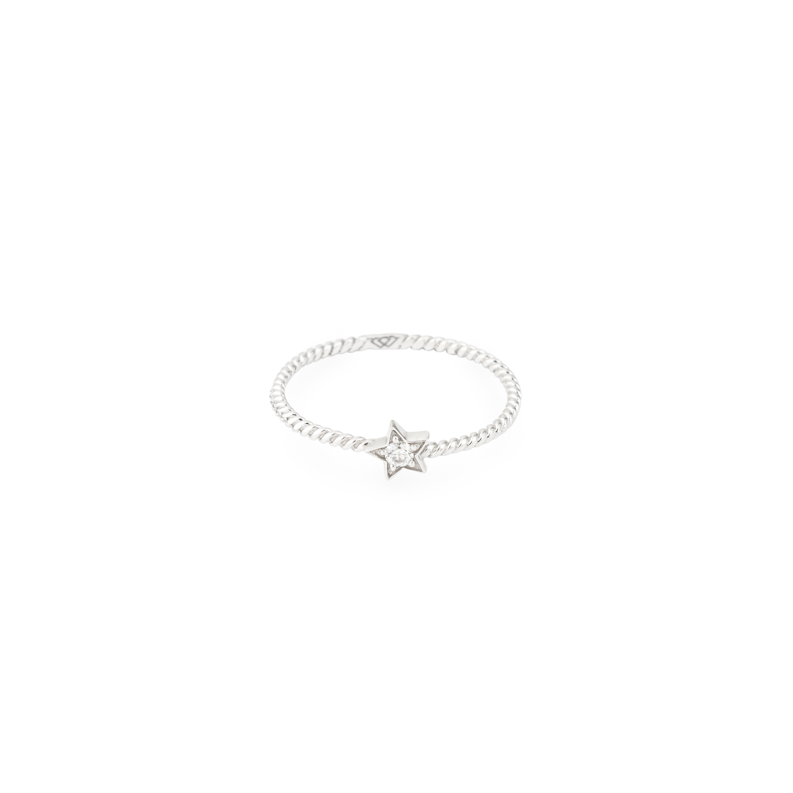 Braided white gold ring with a star