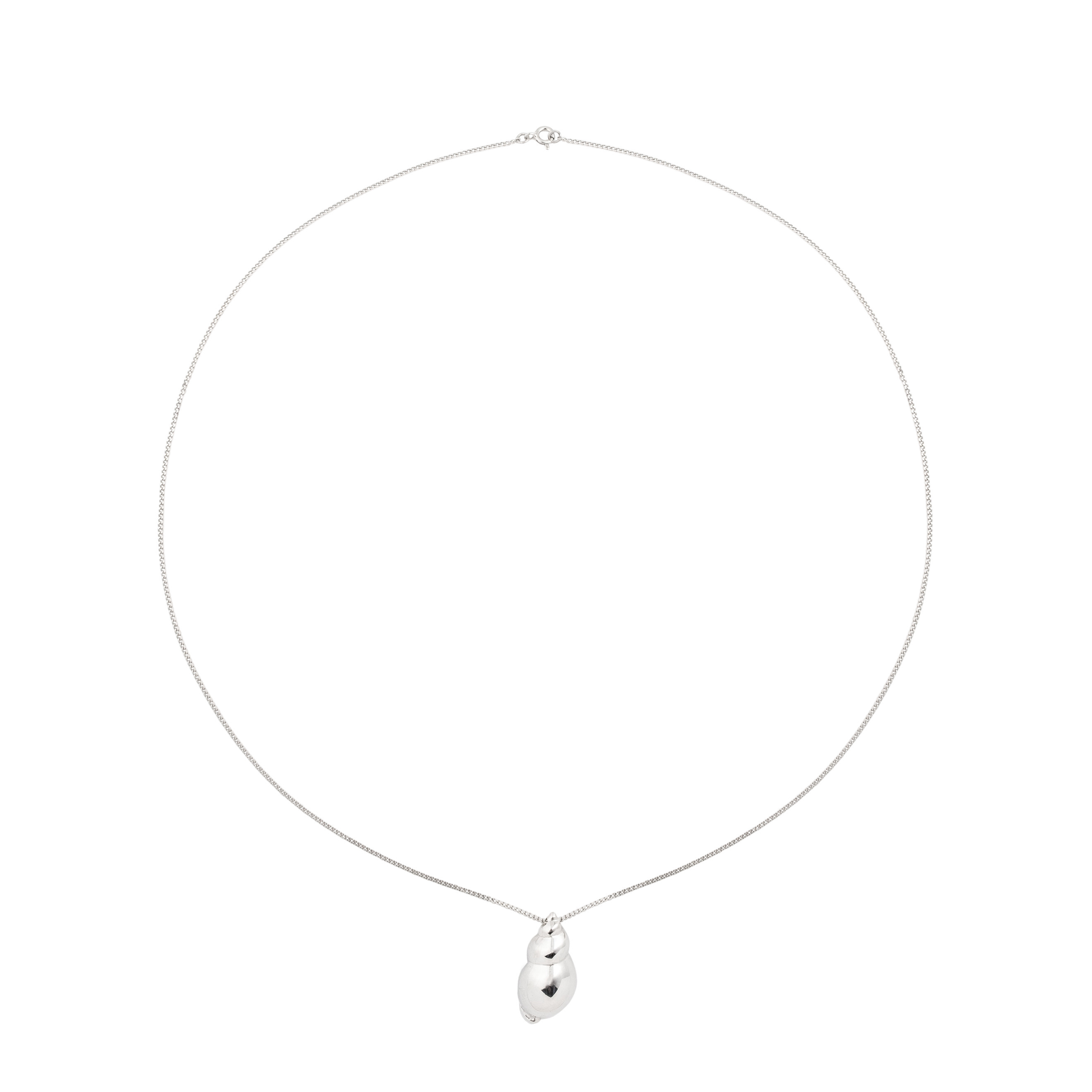 The Shell pendant is large made of white brass