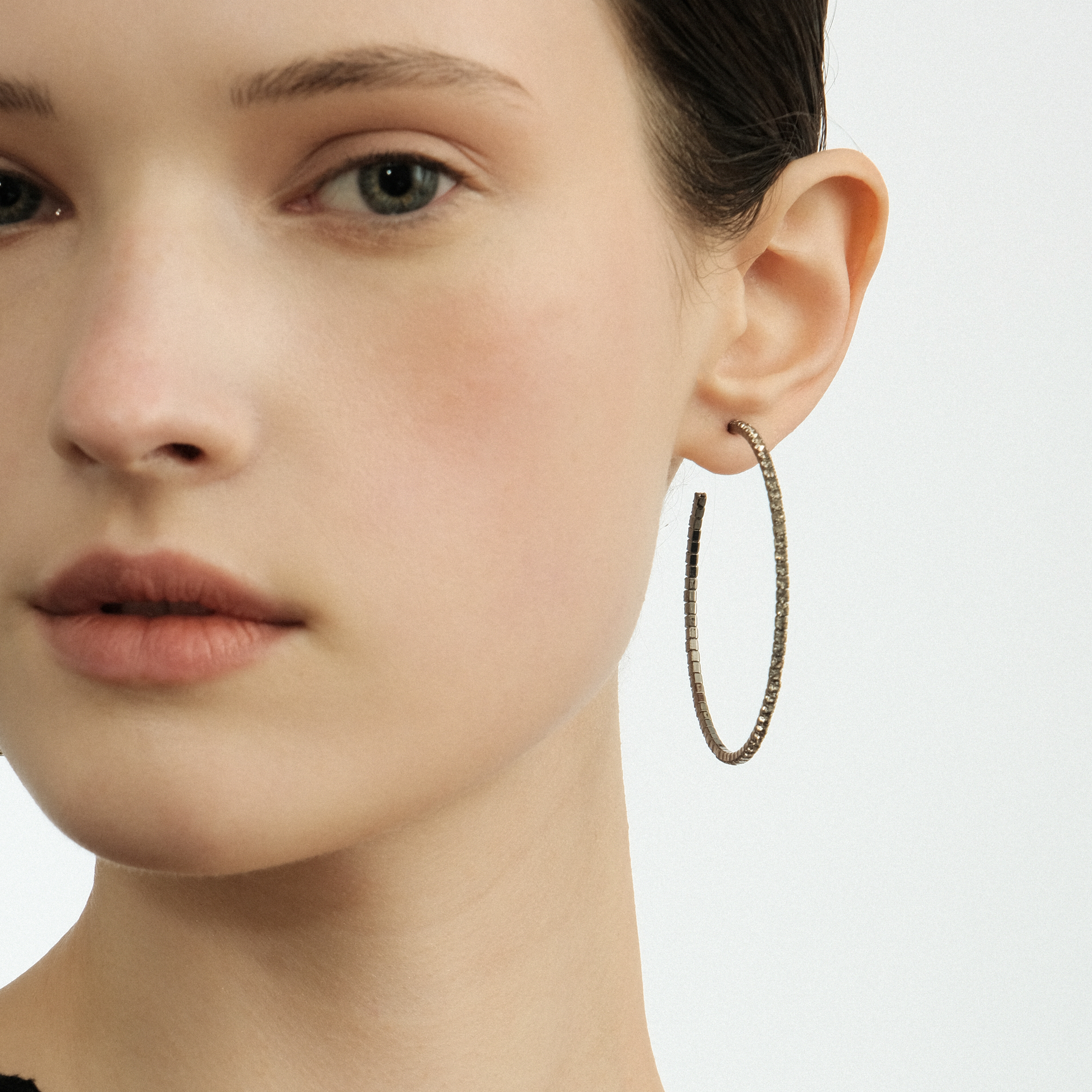 Black hoop earrings with crystals