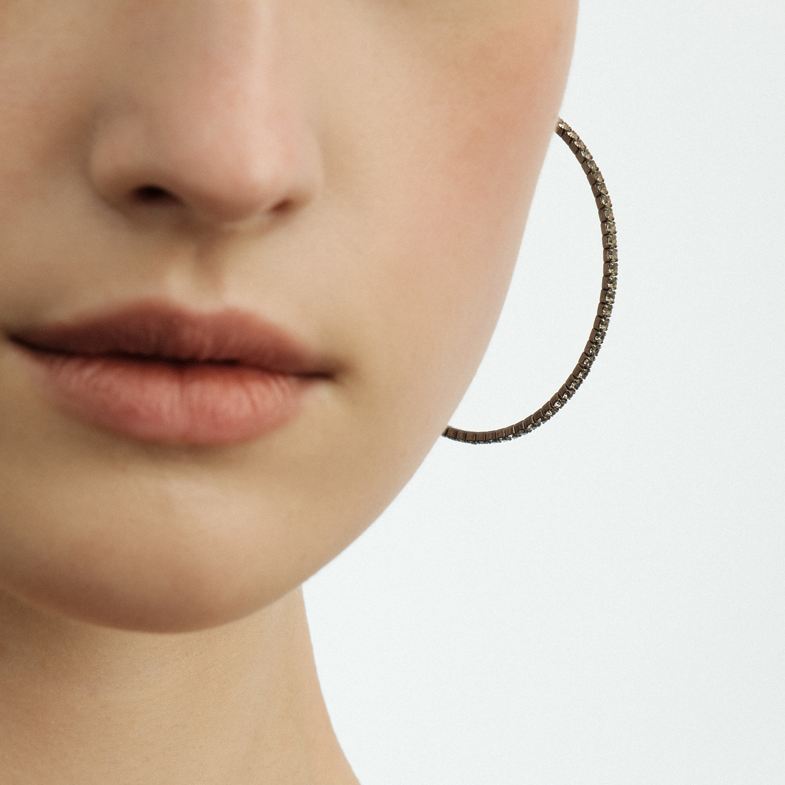 Black hoop earrings with crystals