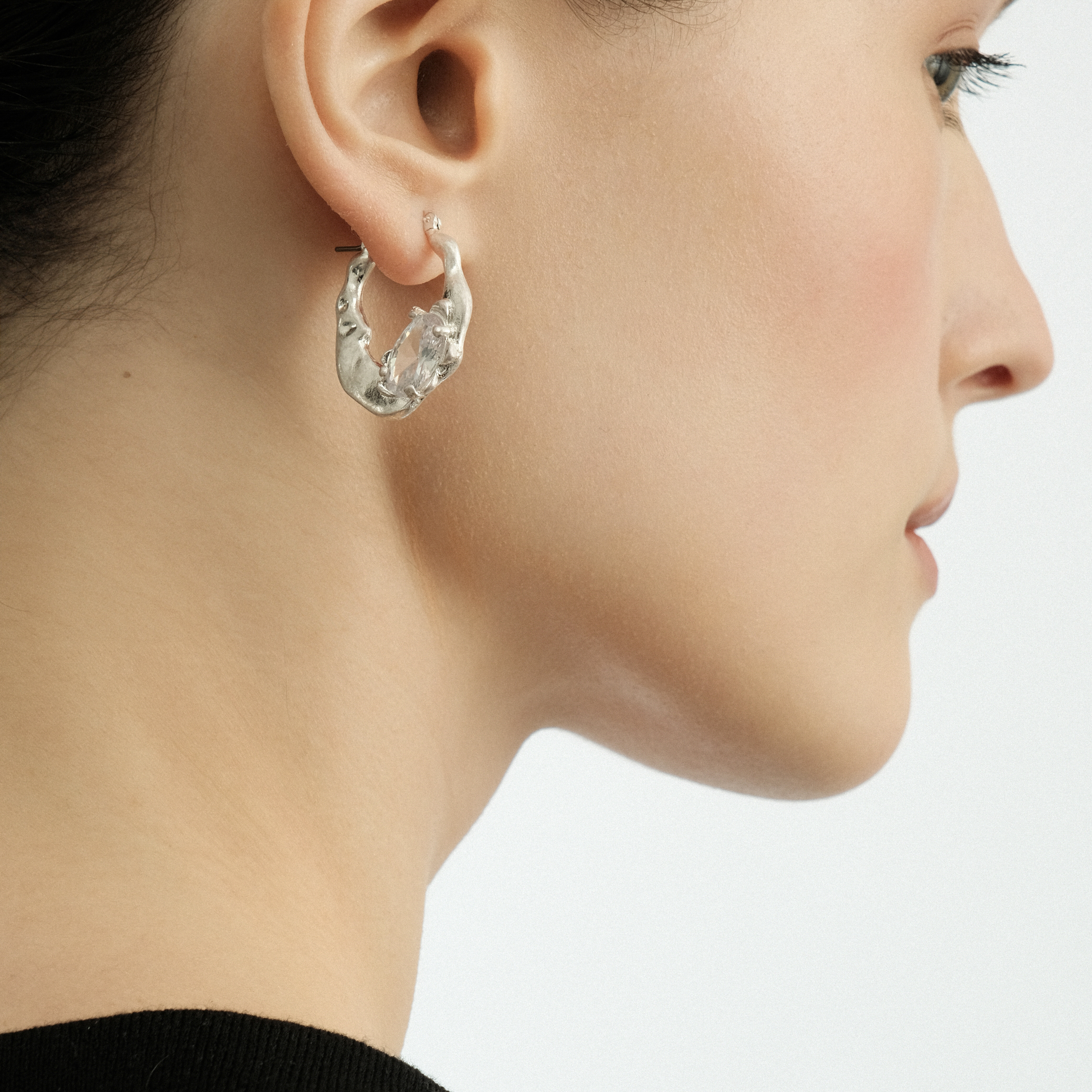 Small silver earrings with oval crystal