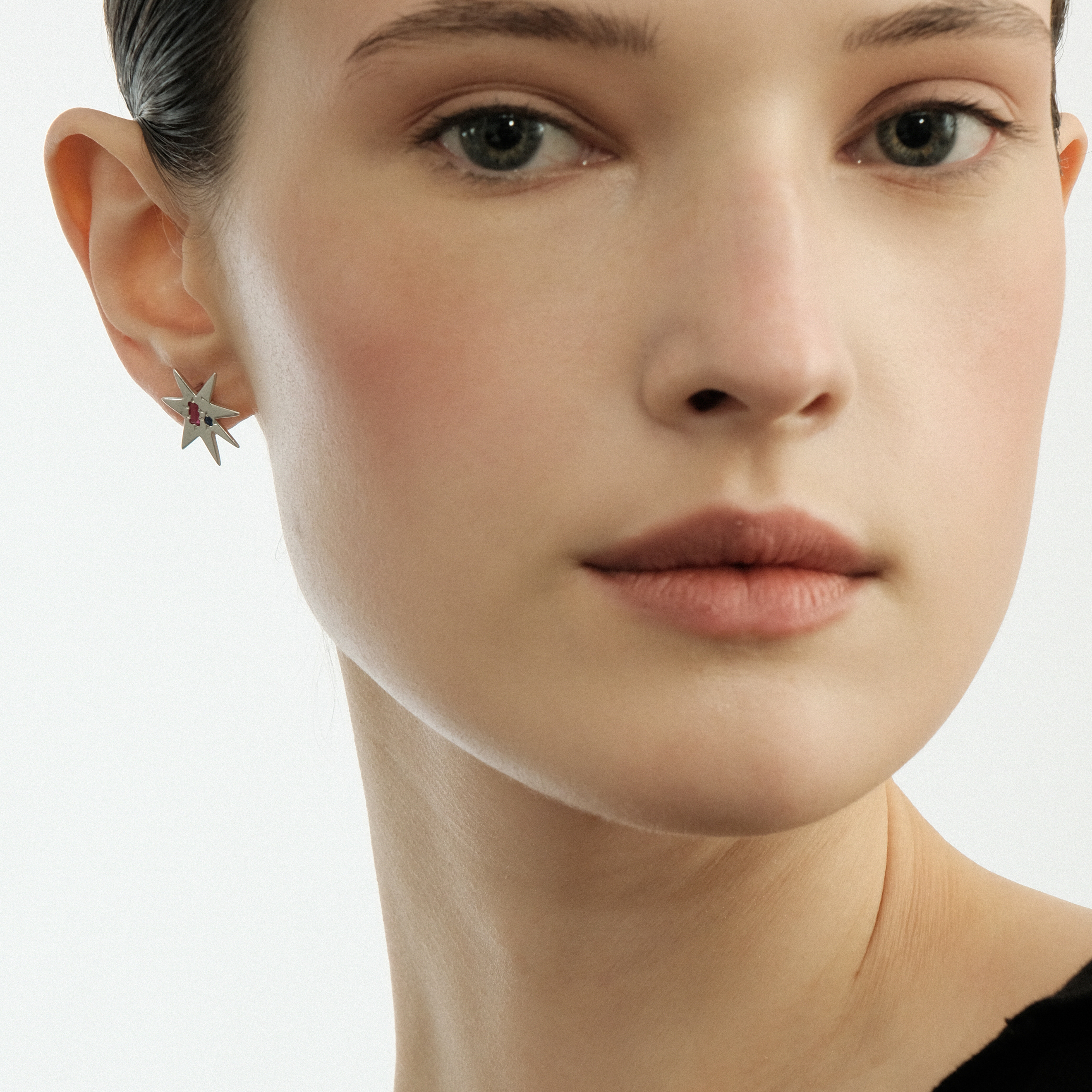 Star earrings made of white brass