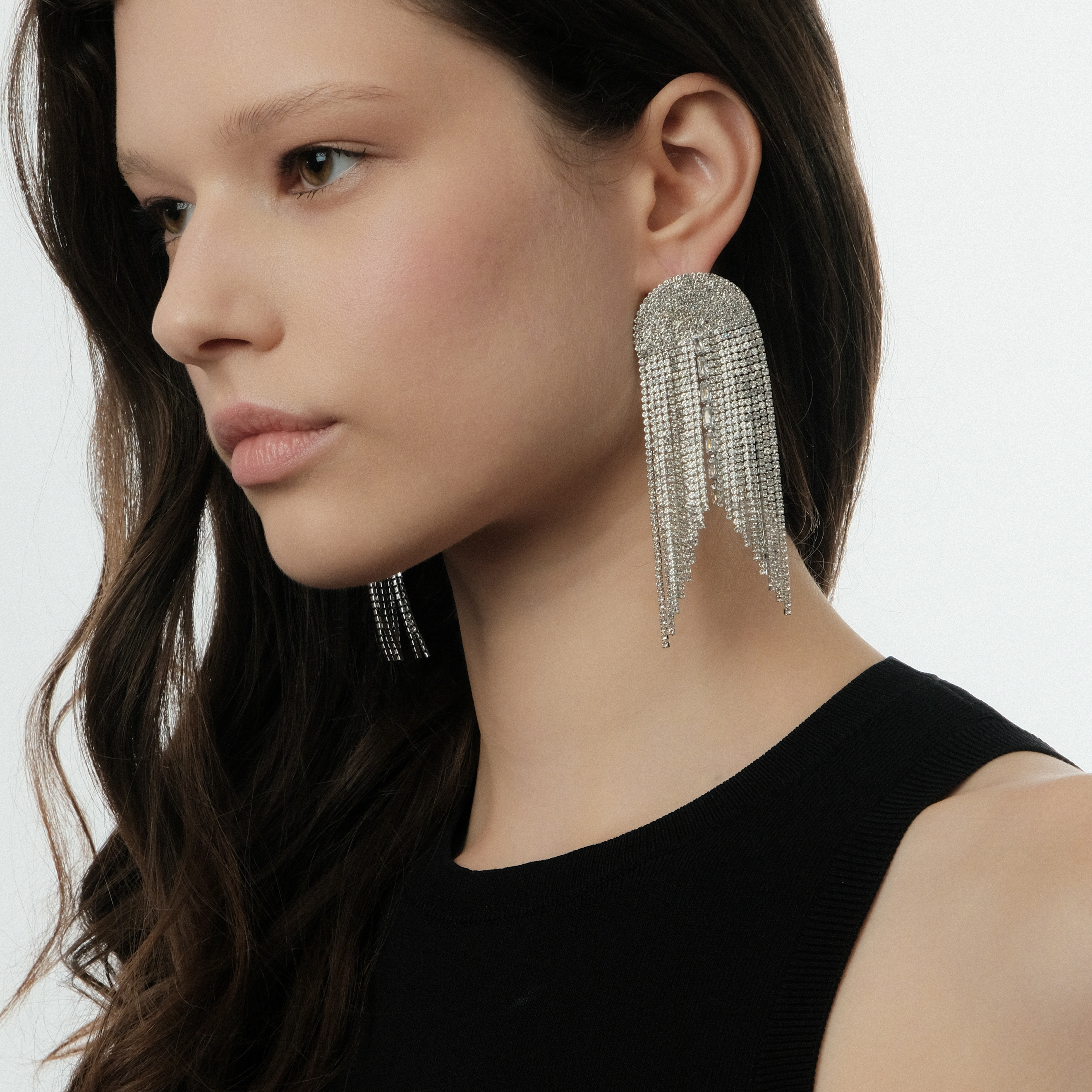 Silver semi-circular earrings with white crystal tracks