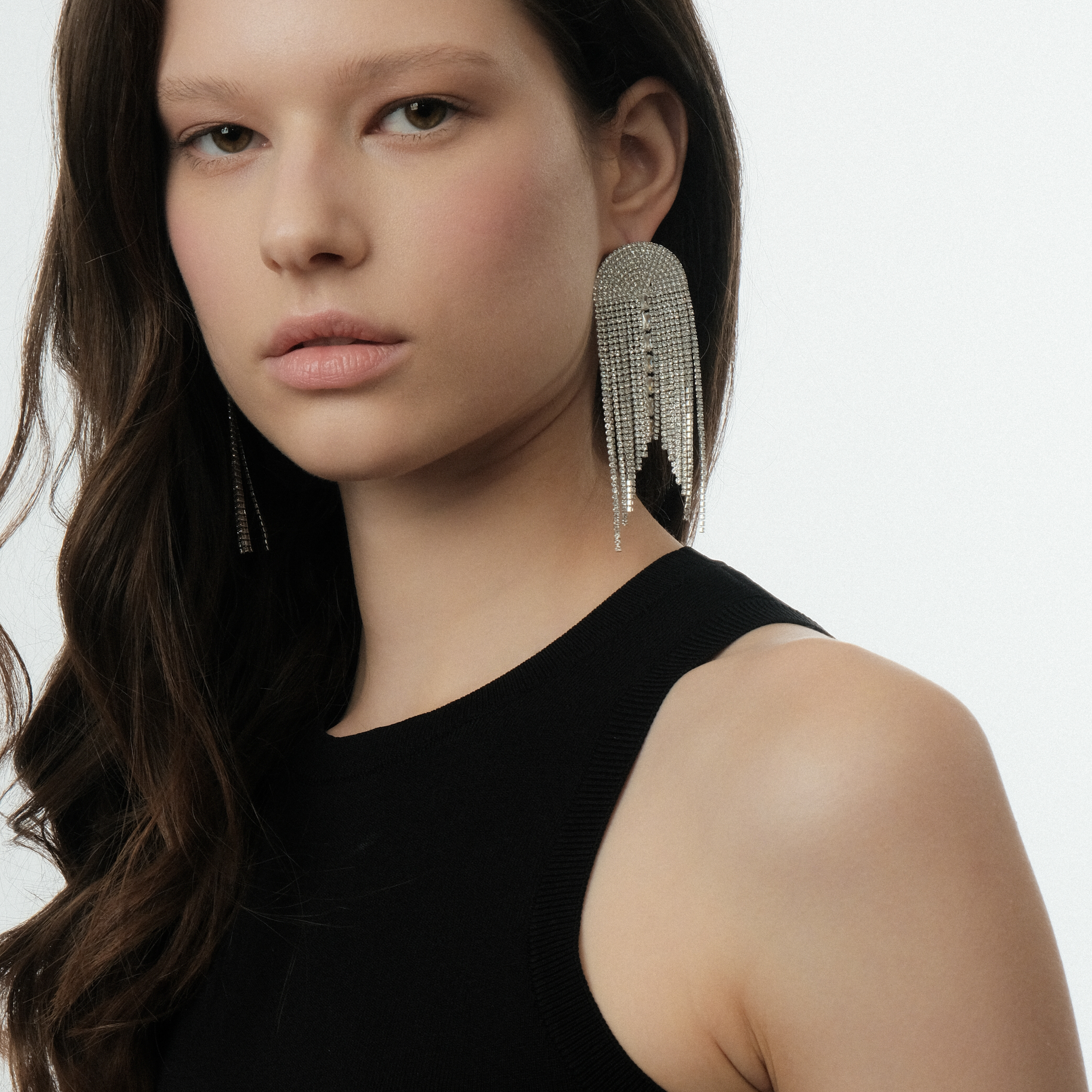 Silver semi-circular earrings with white crystal tracks