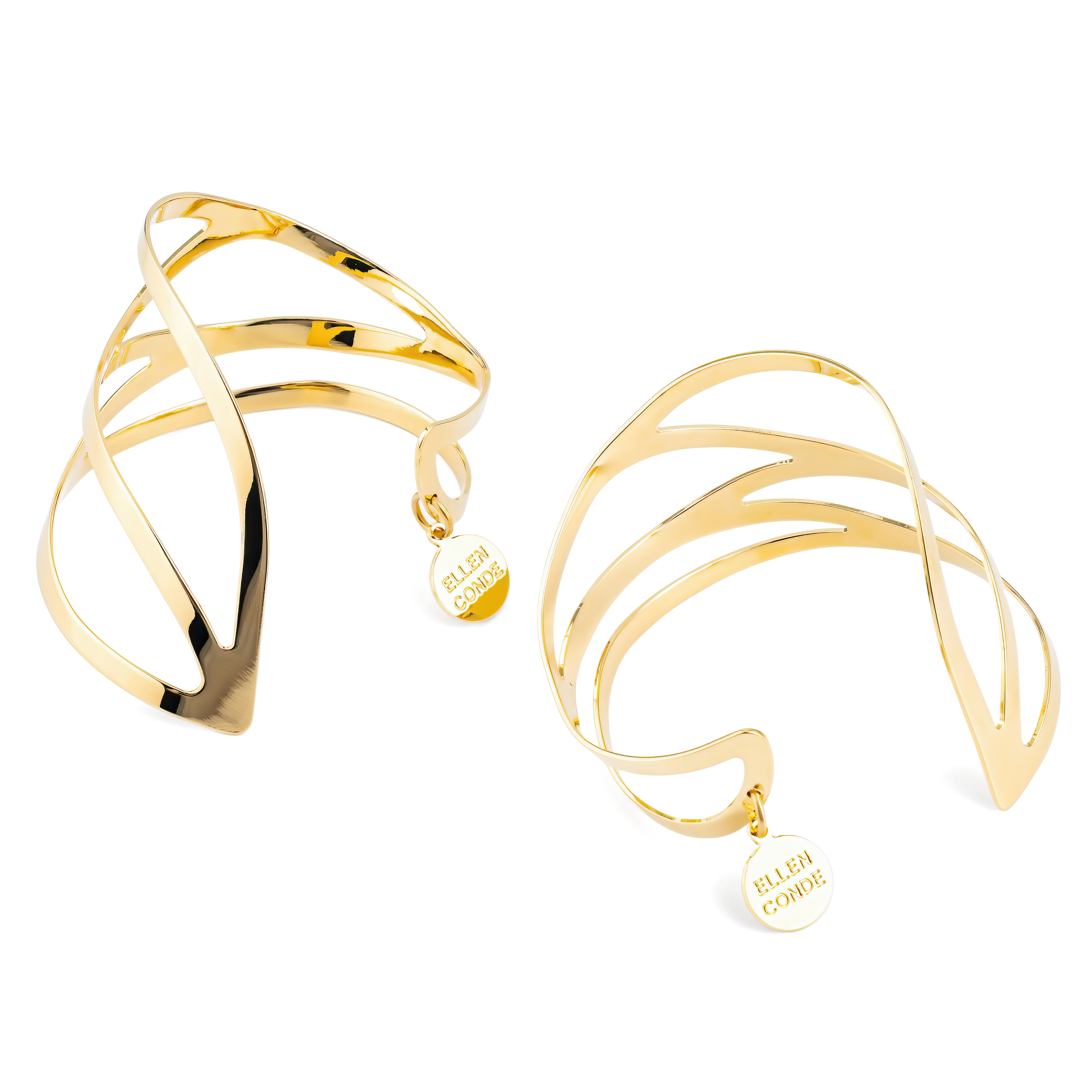 A pair of symmetrical adjustable gold-plated dragonfly bracelets on the wrist
