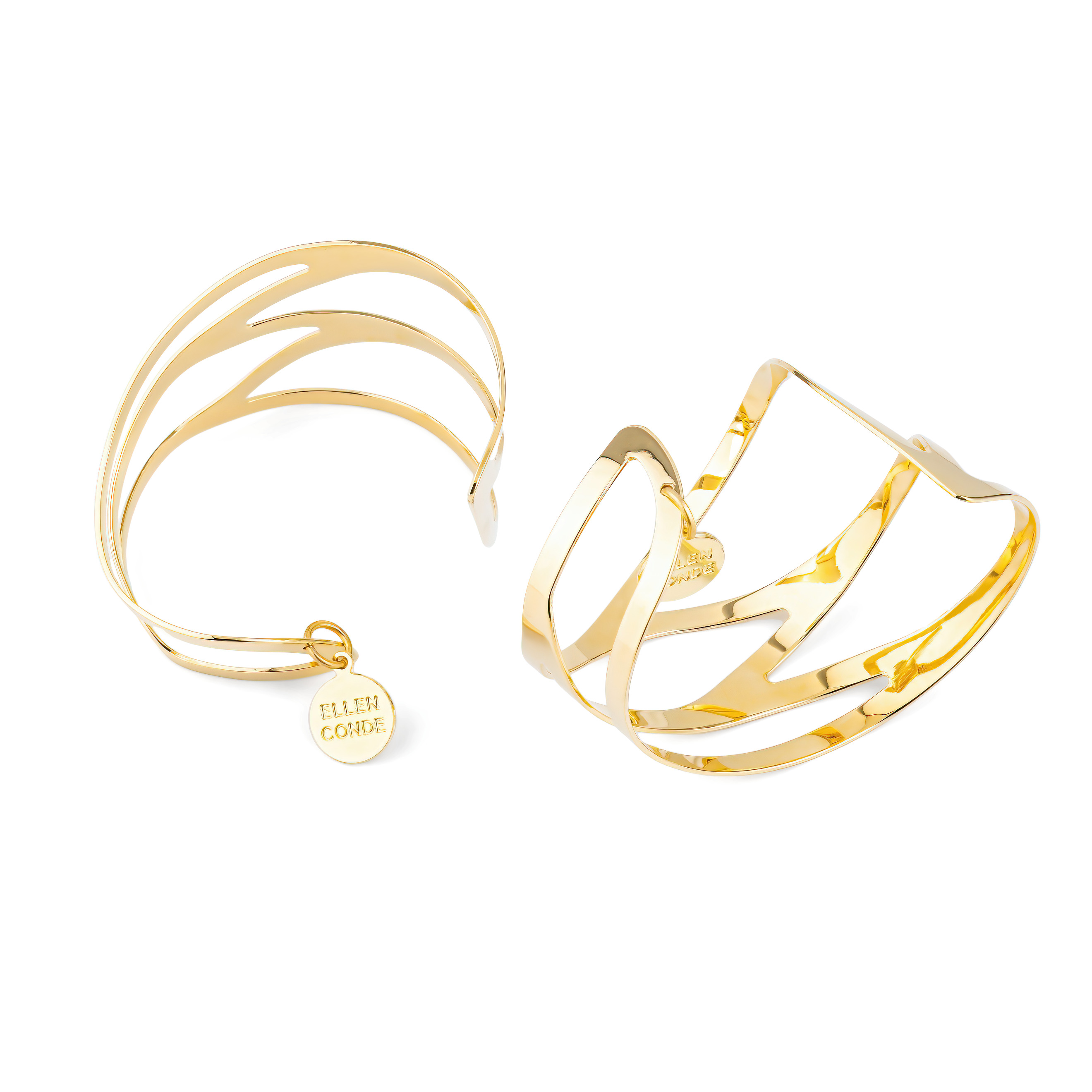 A pair of symmetrical adjustable gold-plated dragonfly bracelets on the wrist