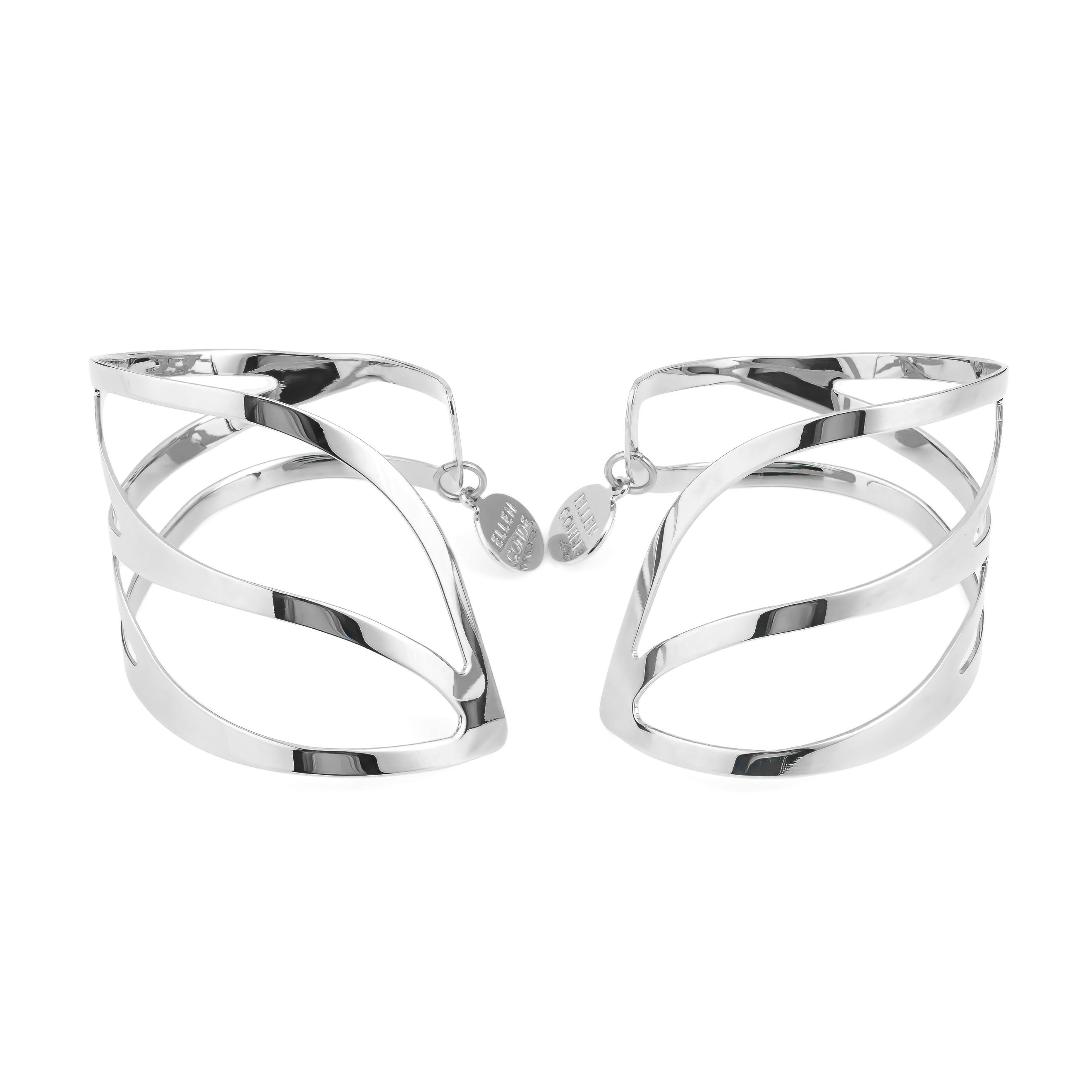 A pair of symmetrical adjustable silver dragonfly bracelets on the wrist