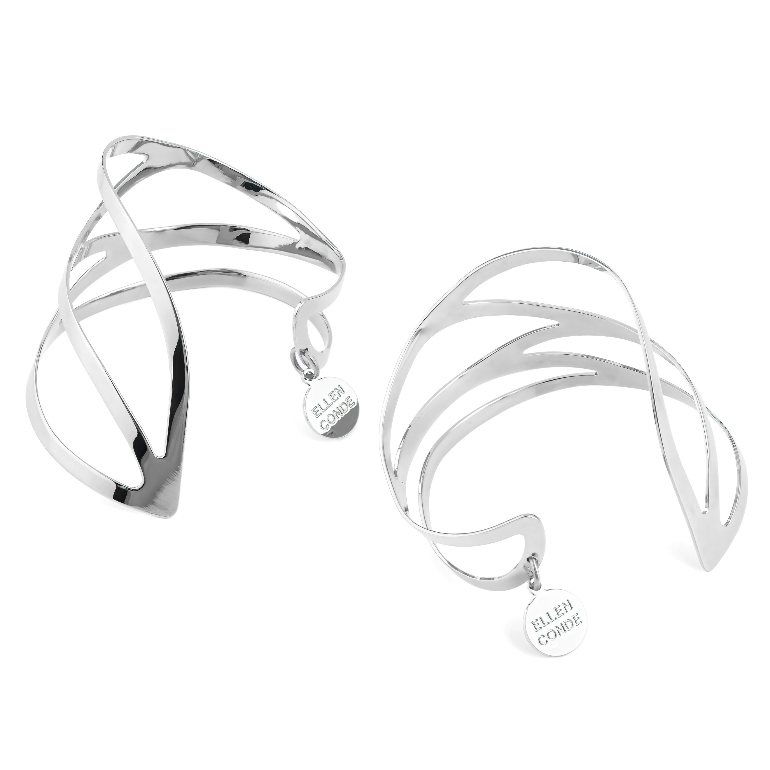 A pair of symmetrical adjustable silver dragonfly bracelets on the wrist