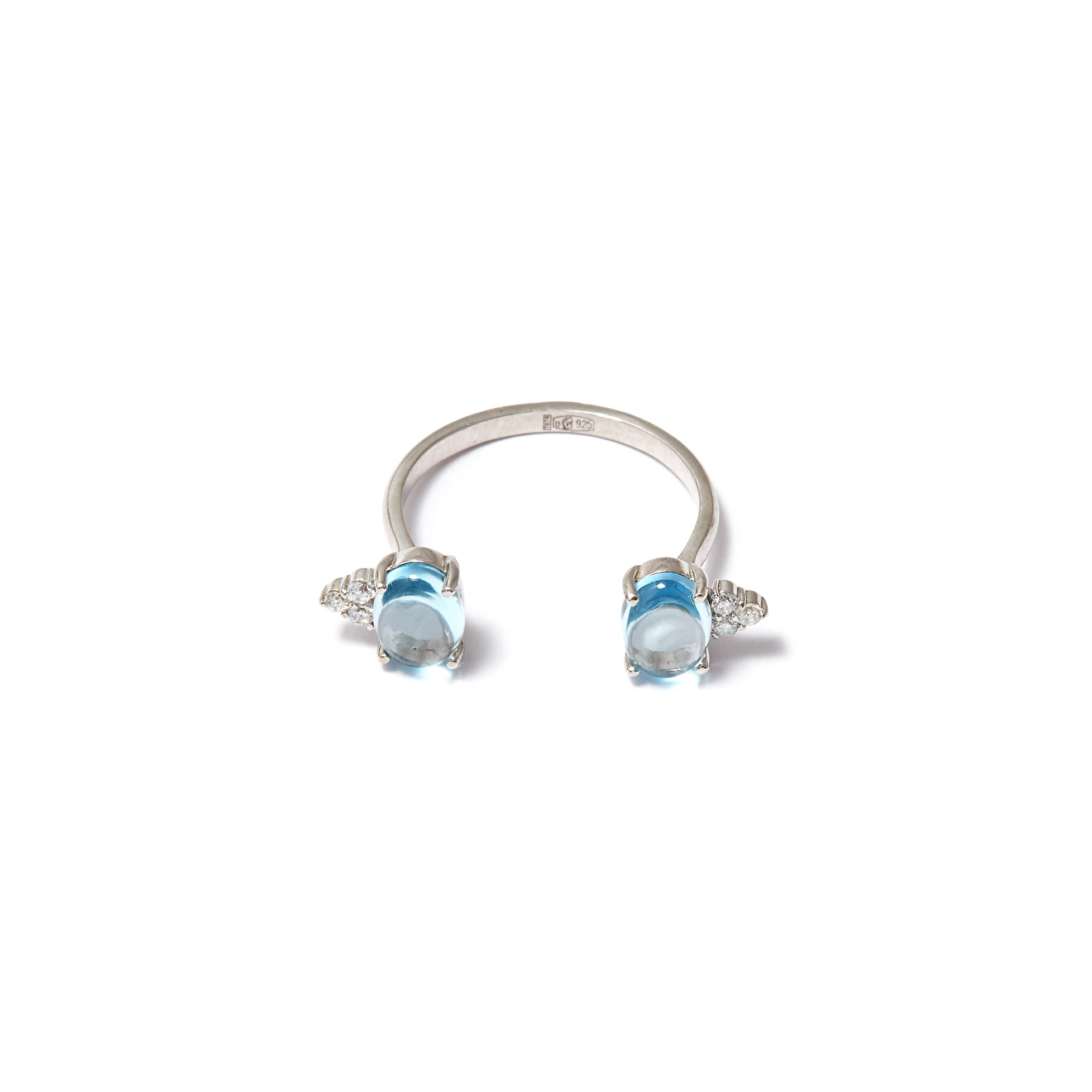 Open silver ring with blue topaz